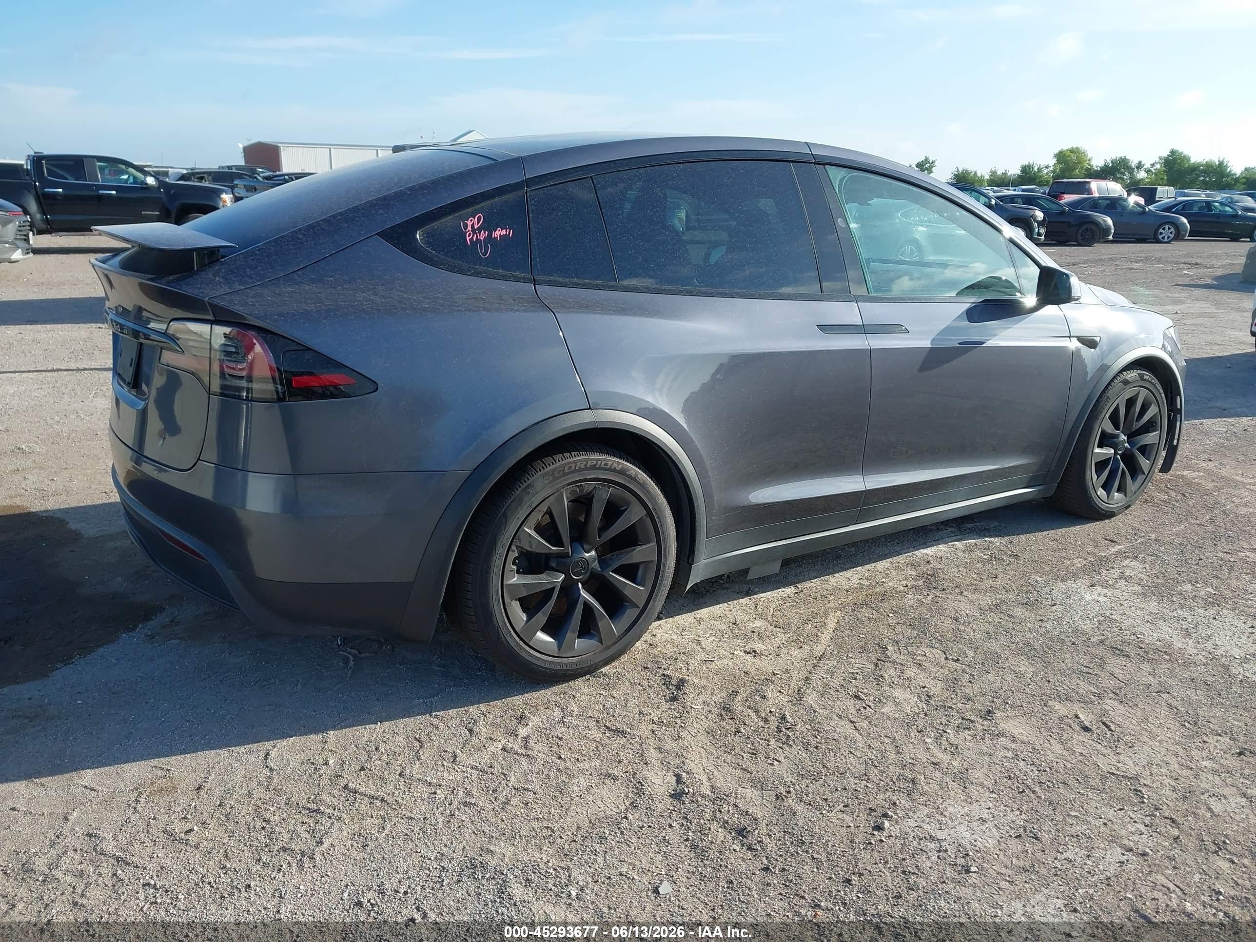 2023 Tesla Model x VIN 7SAXCAE54PF386680 IAAI salvage auction — Unknown, Original (Texas), sold $29,750 on 2026-08-15 (photo 4)