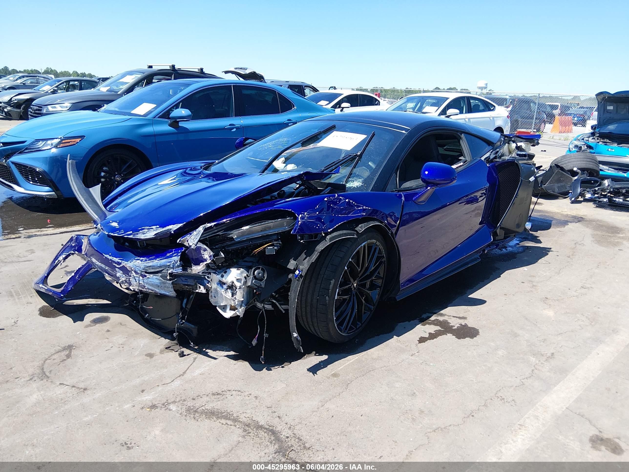 2022 McLaren GT VIN SBM22GCA0NW002052 IAAI salvage auction — Rear End, Junk Receipt (North Carolina), sold $18,025 on 2026-09-09 (photo 2)