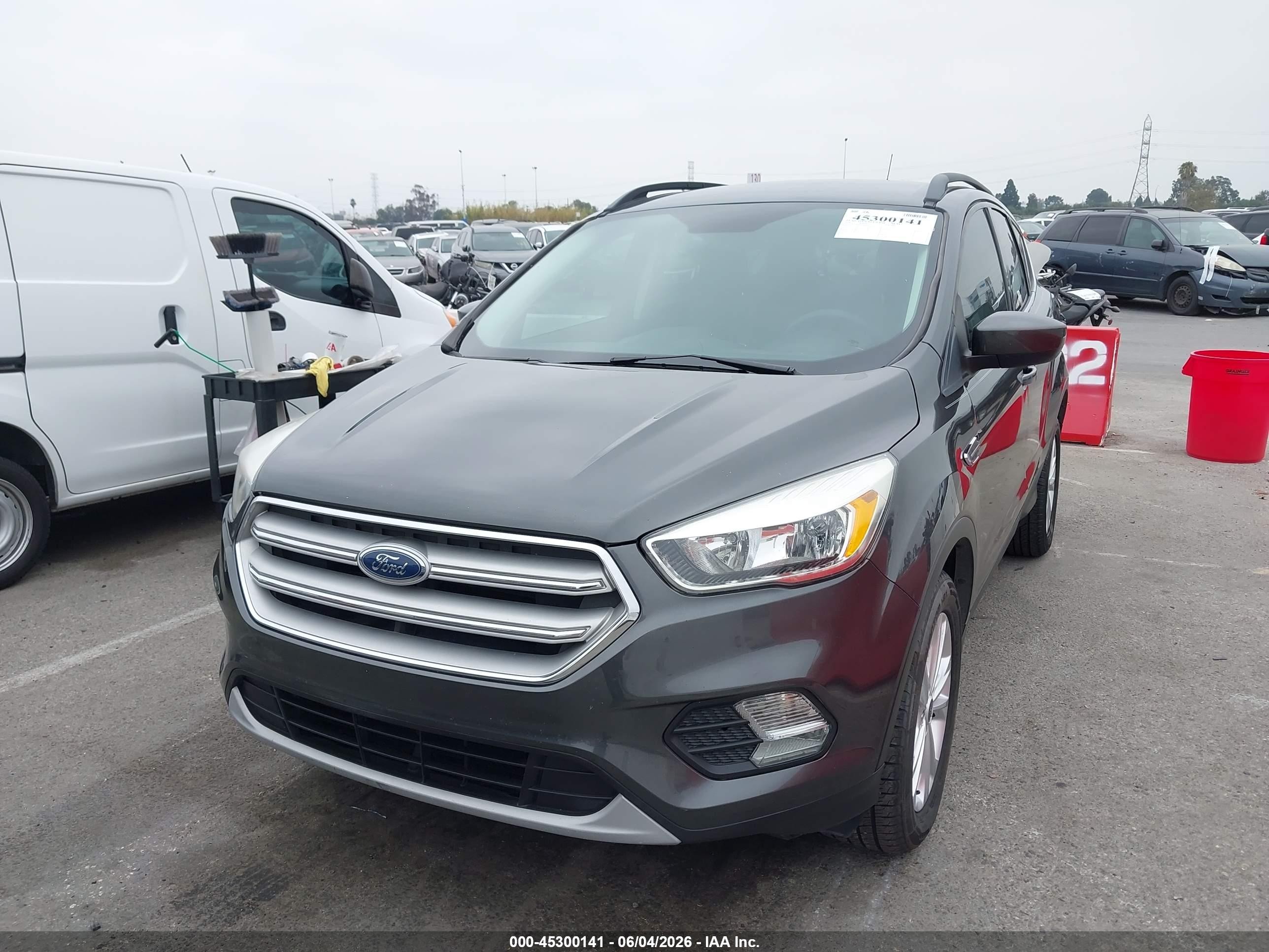 2018 Ford Escape VIN 1FMCU9GD8JUB61099 IAAI salvage auction — Normal Wear, Clear-Dealer Only (Arizona), sold $2,050 on 2026-07-09 (photo 2)