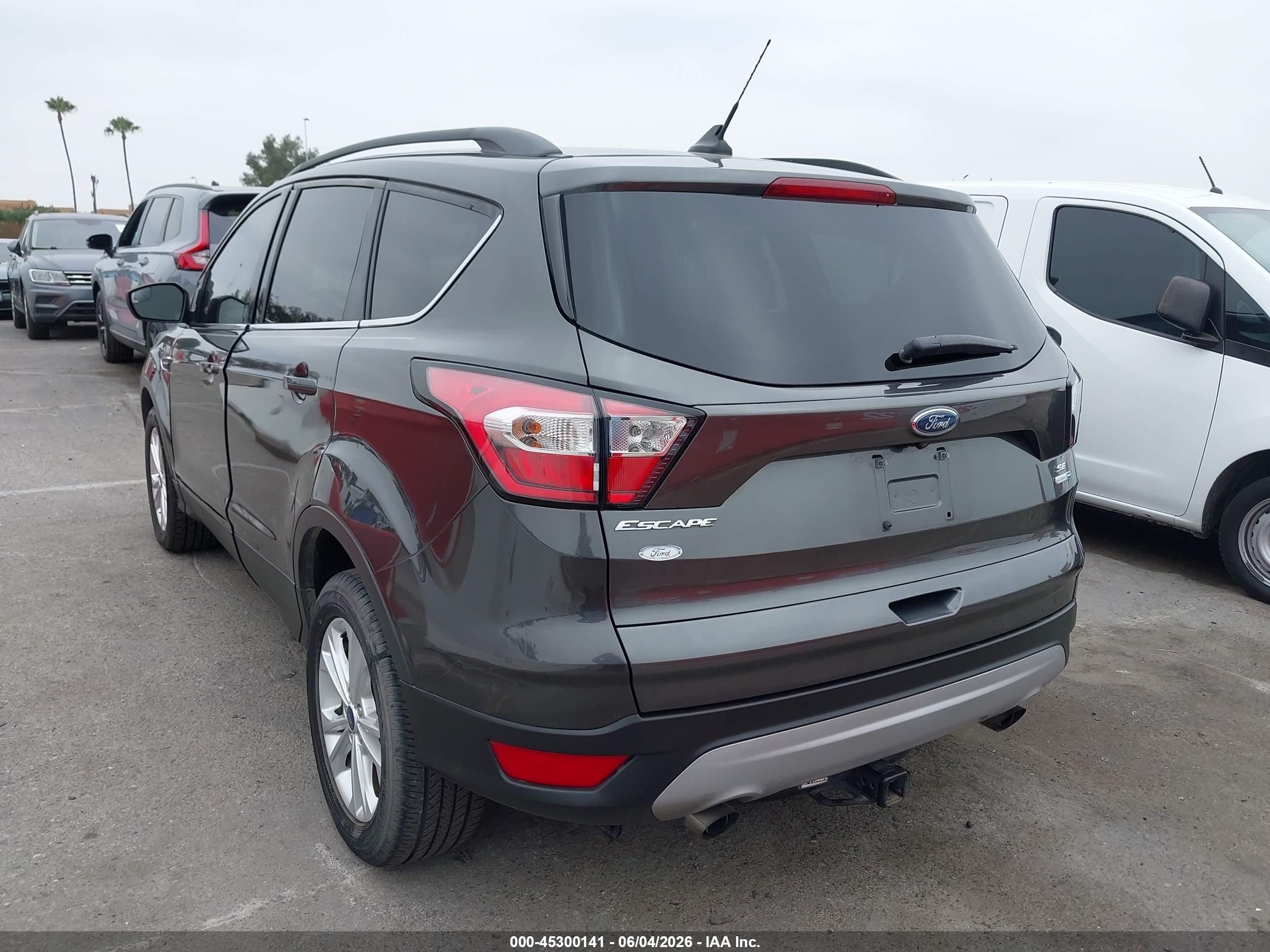2018 Ford Escape VIN 1FMCU9GD8JUB61099 IAAI salvage auction — Normal Wear, Clear-Dealer Only (Arizona), sold $2,050 on 2026-07-09 (photo 3)