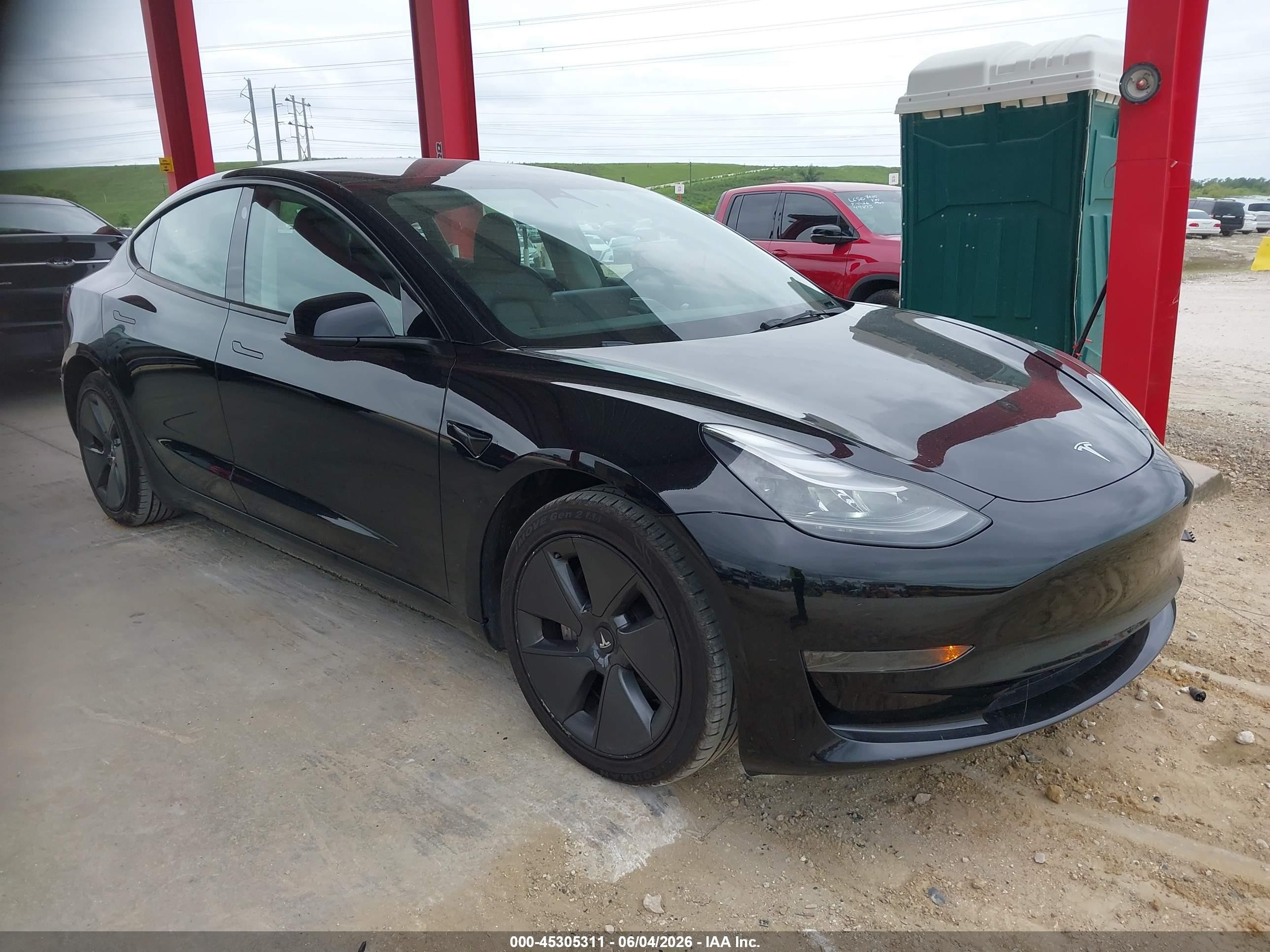 2023 Tesla Model 3 VIN 5YJ3E1EA6PF433985 IAAI salvage auction — Electrical, Certificate Of Title (Montana), sold $11,250 on 2026-06-30 (photo 1)