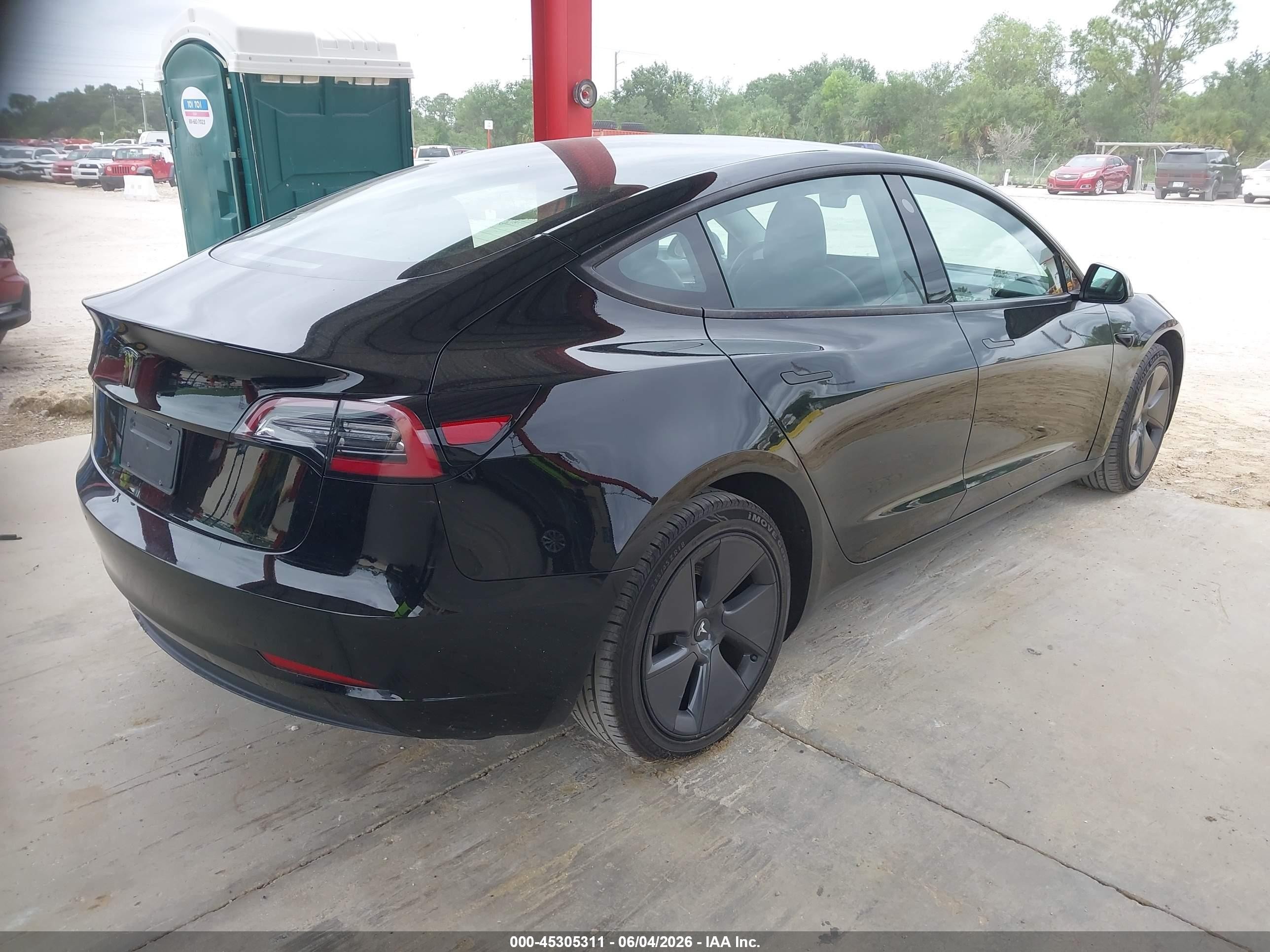 2023 Tesla Model 3 VIN 5YJ3E1EA6PF433985 IAAI salvage auction — Electrical, Certificate Of Title (Montana), sold $11,250 on 2026-06-30 (photo 4)