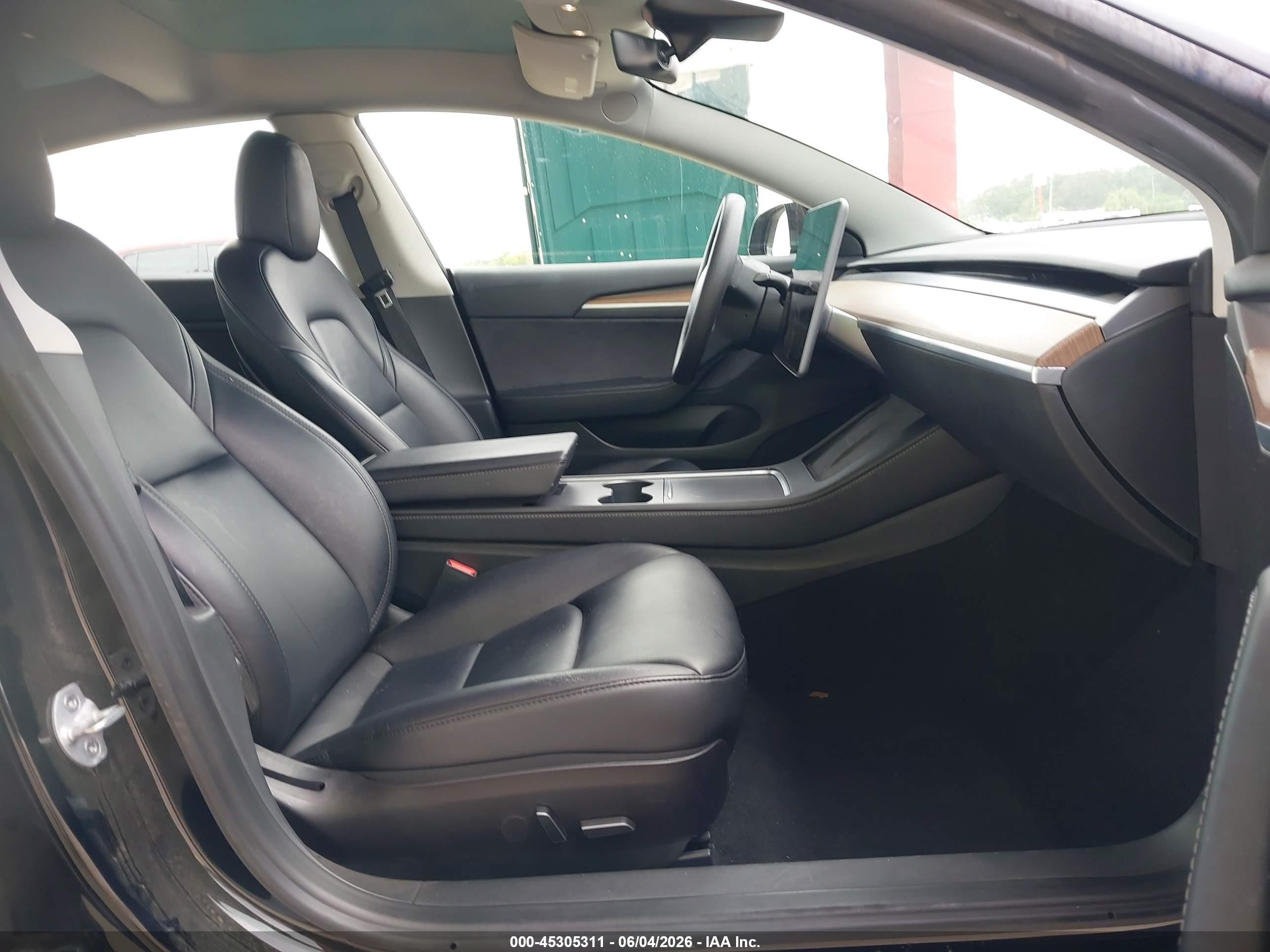 2023 Tesla Model 3 VIN 5YJ3E1EA6PF433985 IAAI salvage auction — Electrical, Certificate Of Title (Montana), sold $11,250 on 2026-06-30 (photo 5)