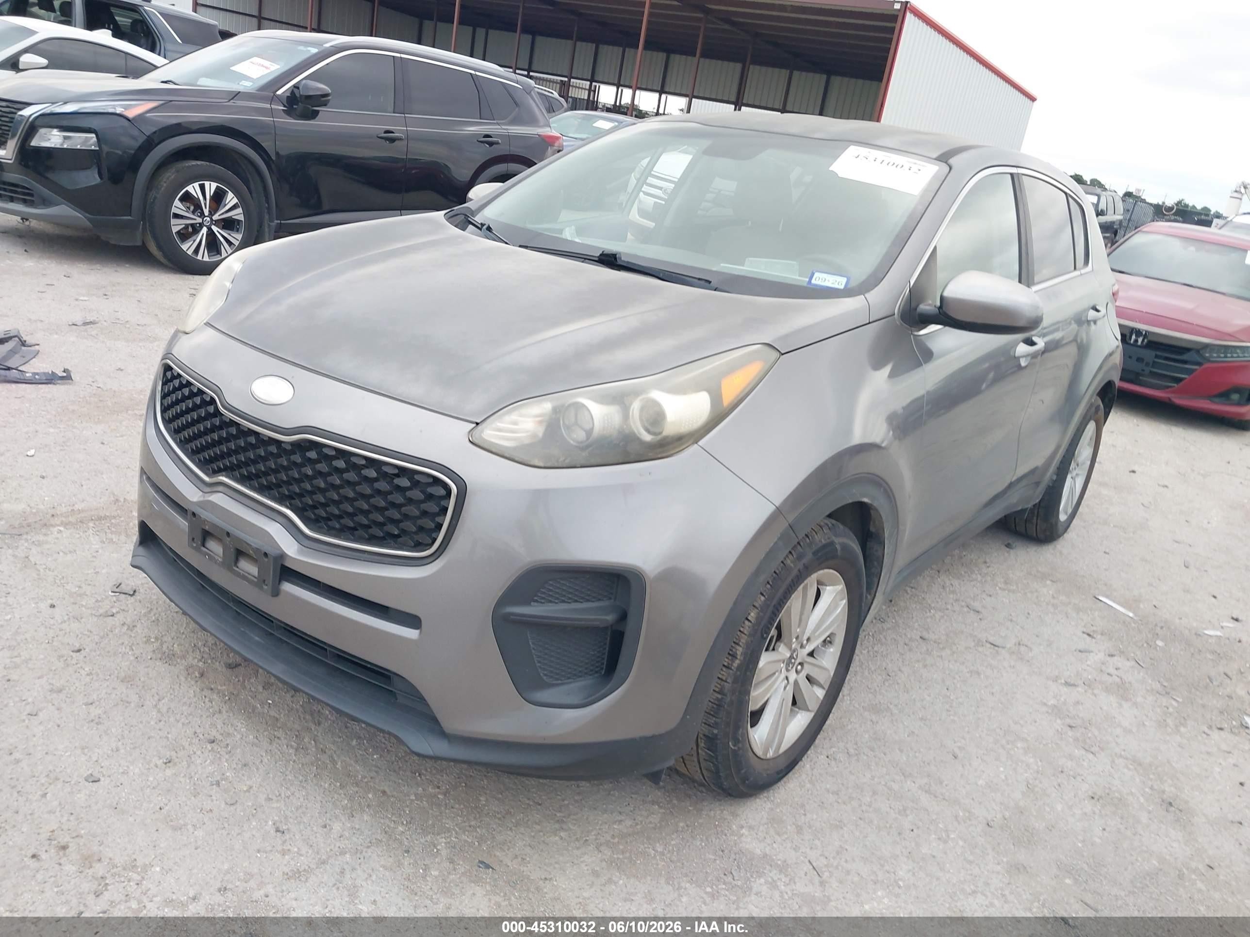 2017 Kia Sportage VIN KNDPM3AC4H7160480 IAAI salvage auction — Side, Original (Texas), sold $1,900 on 2026-07-10 (photo 2)