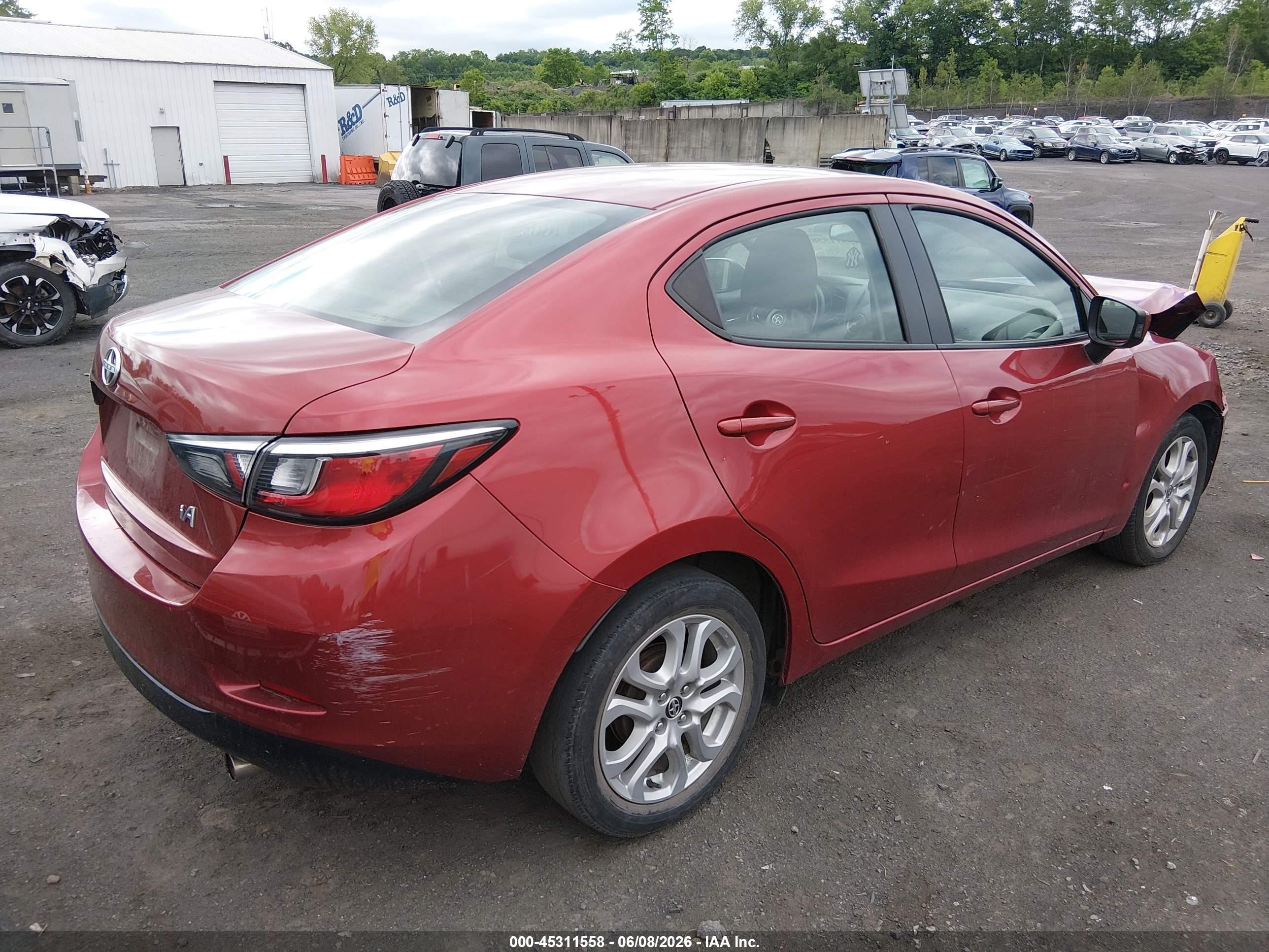 2016 Scion iA VIN 3MYDLBZV0GY127643 IAAI salvage auction — Unknown, Salvage (Idaho), sold $1,300 on 2026-09-16 (photo 4)