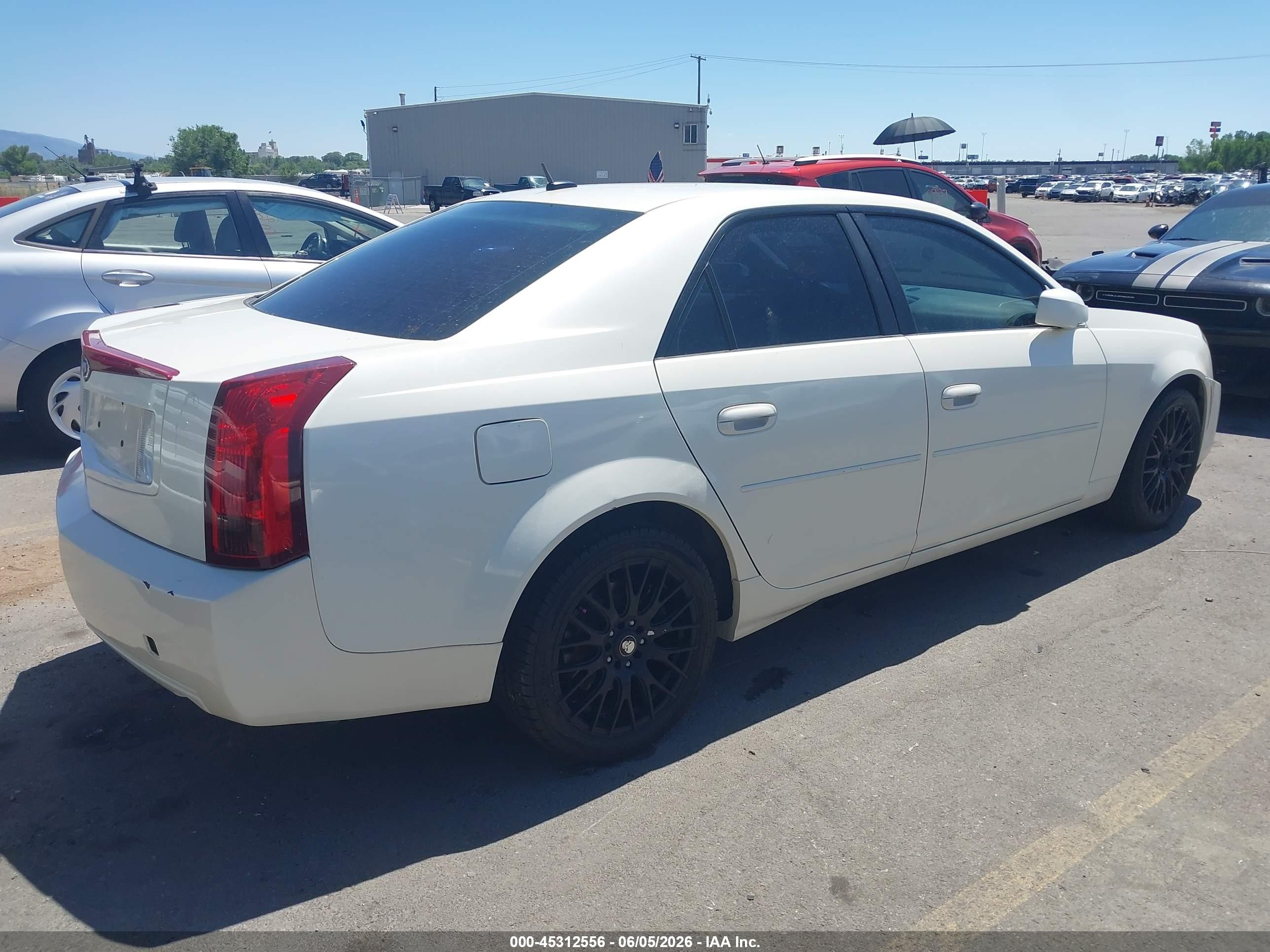 2005 Cadillac CTS VIN 1G6DP567050137030 IAAI salvage auction — Side, Salvage (Utah), sold $250 on 2026-07-09 (photo 4)