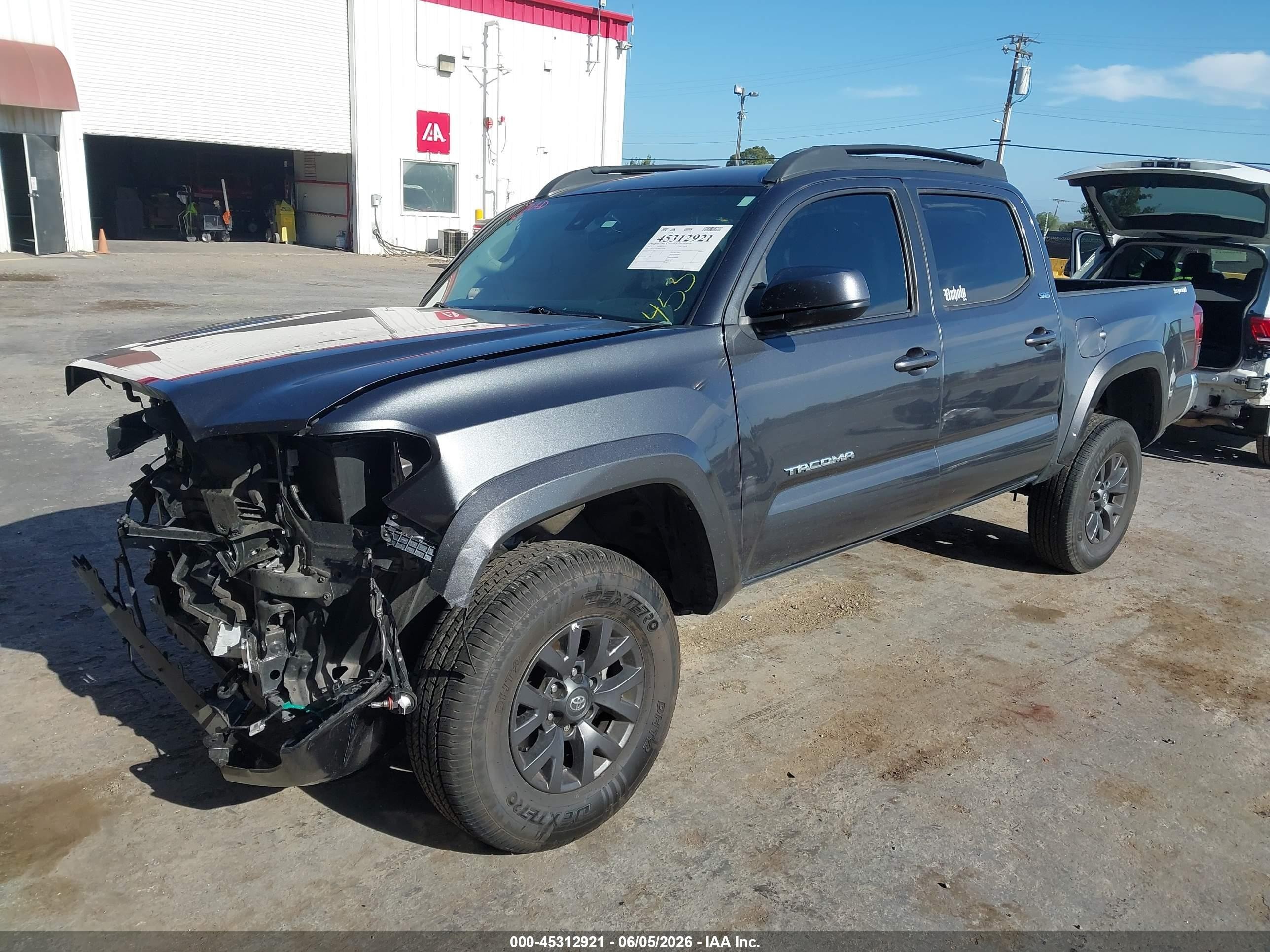 2023 Toyota Tacoma VIN 3TMAZ5CN2PM214719 IAAI salvage auction — Unknown, Salvage (California), sold $6,100 on 2026-07-09 (photo 2)