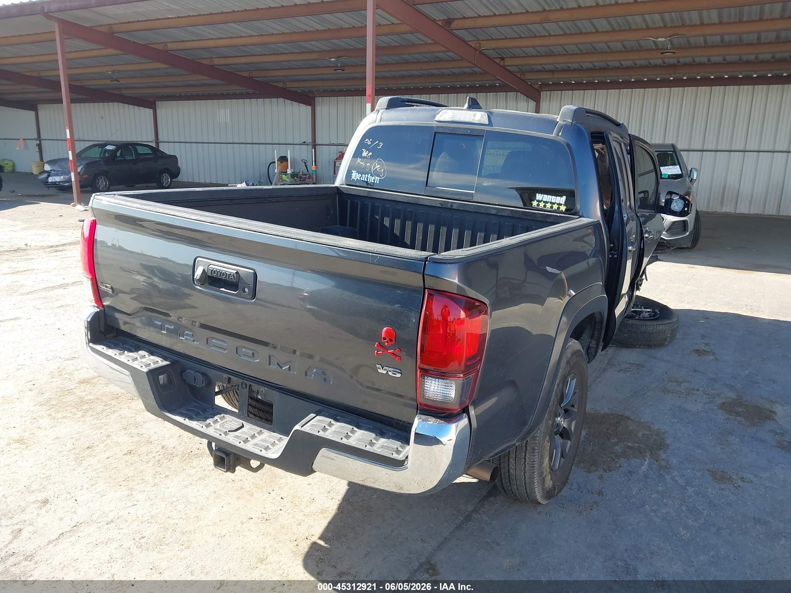 2023 Toyota Tacoma VIN 3TMAZ5CN2PM214719 IAAI salvage auction — Unknown, Salvage (California), sold $6,100 on 2026-07-09 (photo 4)