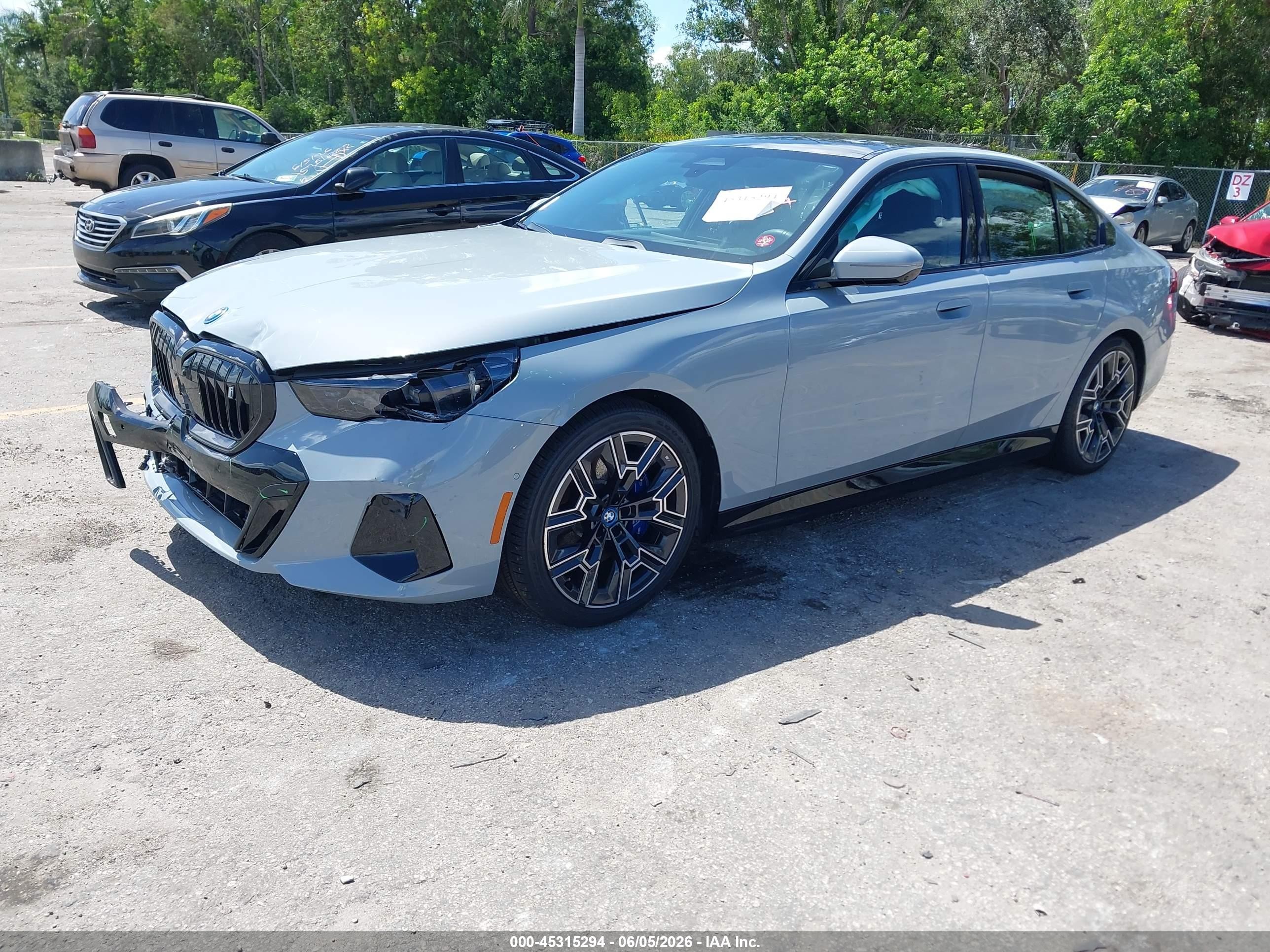 2024 BMW i5 VIN WBY33FK05RCR50157 IAAI salvage auction — Front End, Rebuildable (Florida), sold $27,750 on 2026-08-14 (photo 2)