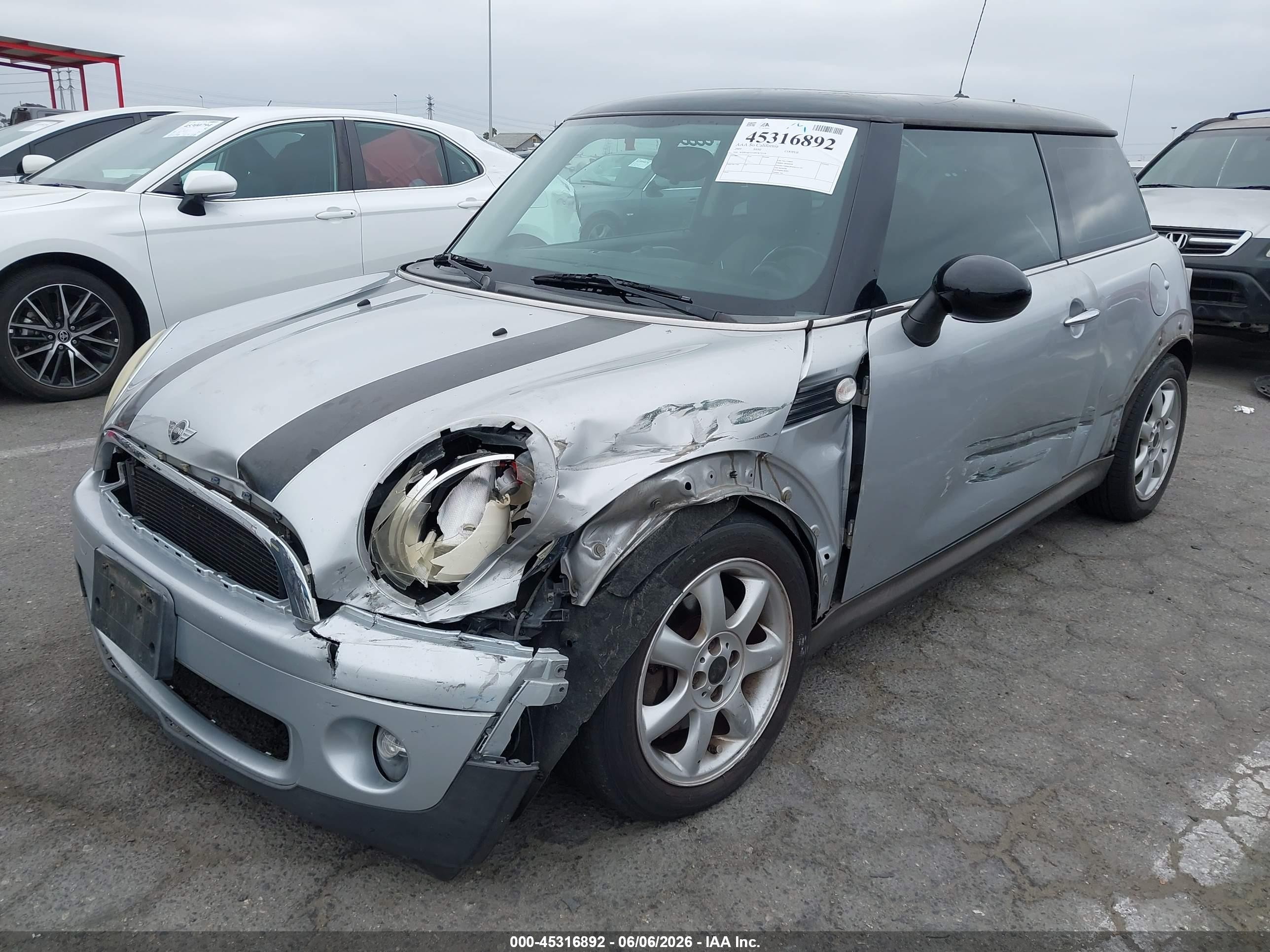 2009 Mini Cooper VIN WMWMF33589TW72518 IAAI salvage auction — Side, Salvage (California), sold $600 on 2026-07-08 (photo 2)