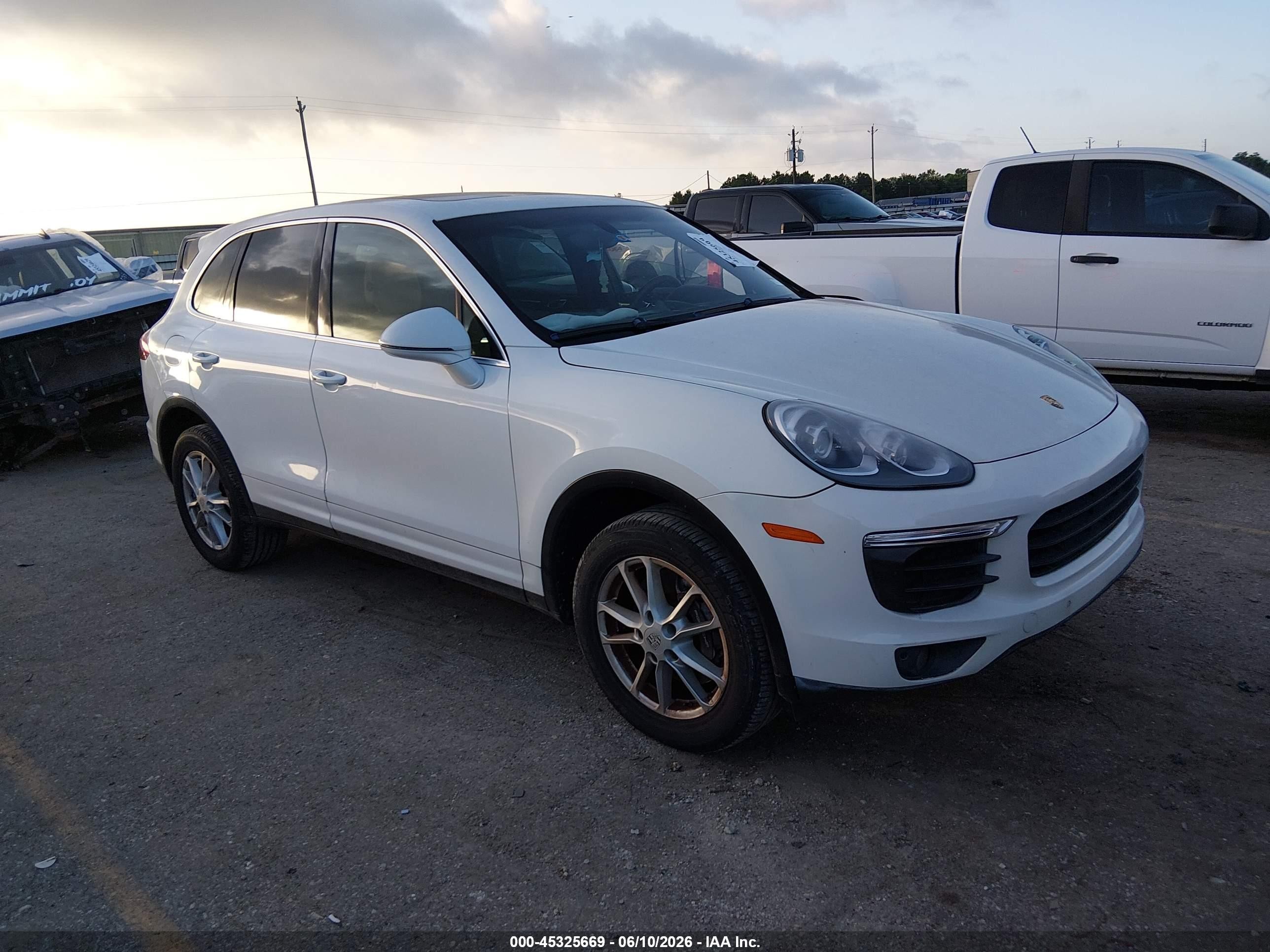2016 Porsche Cayenne VIN WP1AA2A21GKA08053 IAAI salvage auction — Water/Flood, Salvage (Texas), sold $3,000 on 2026-07-01 (photo 1)