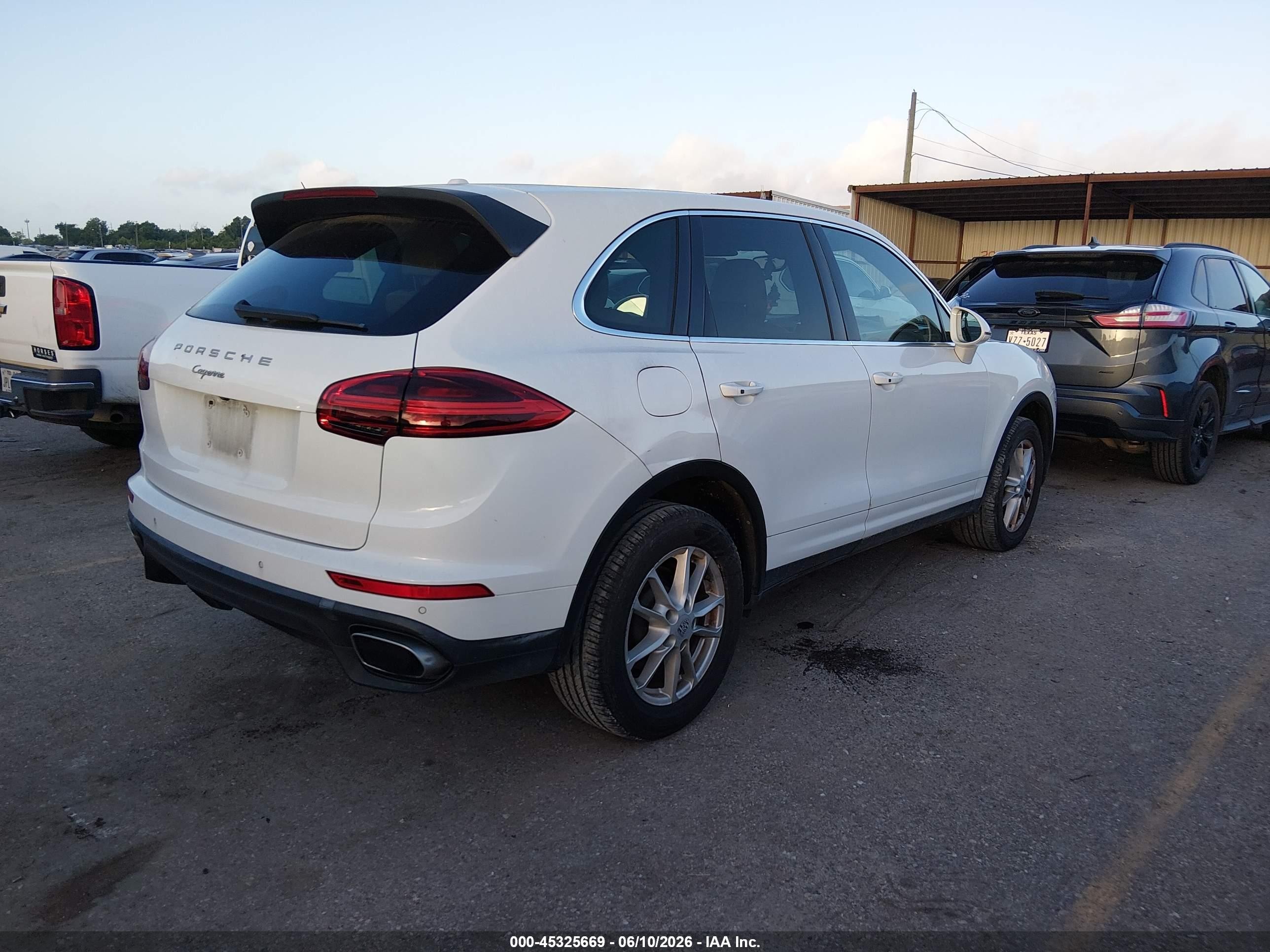 2016 Porsche Cayenne VIN WP1AA2A21GKA08053 IAAI salvage auction — Water/Flood, Salvage (Texas), sold $3,000 on 2026-07-01 (photo 4)