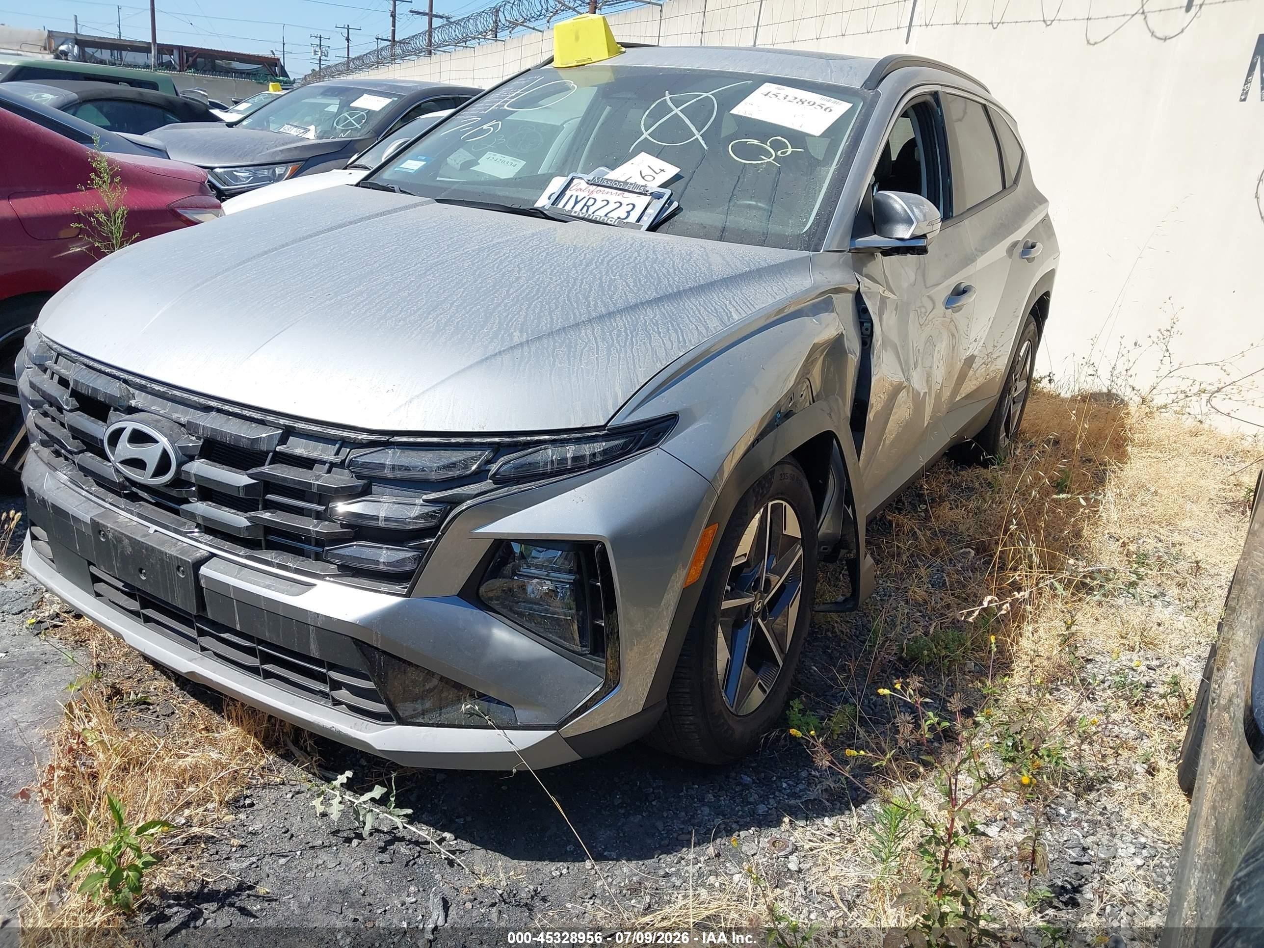 2025 Hyundai Tucson VIN 5NMJC3DE0SH580050 IAAI salvage auction — Side, Salvage Certificate (California), sold $9,600 on 2026-07-12 (photo 2)