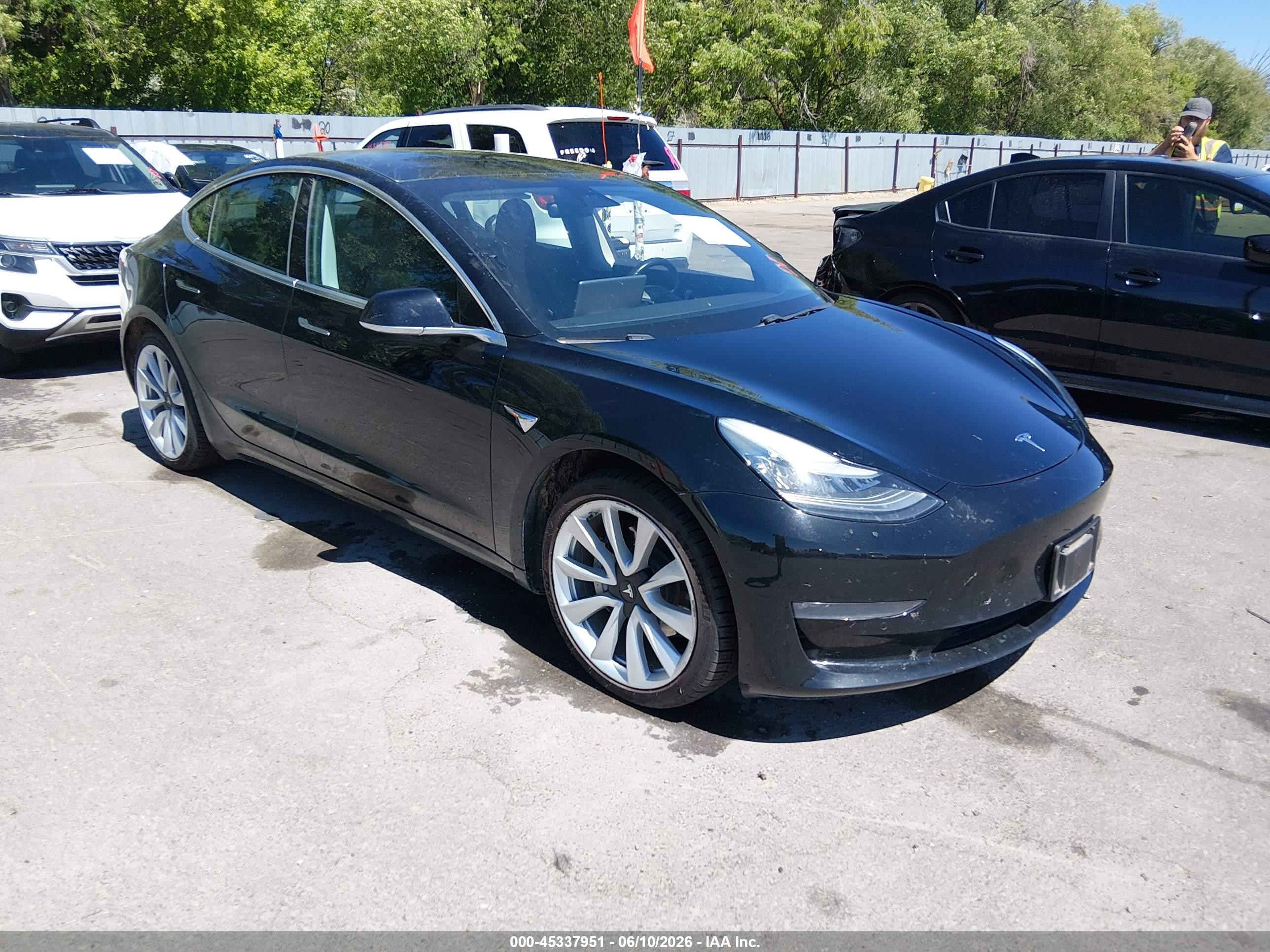 2019 Tesla Model 3 VIN 5YJ3E1EB2KF388660 — IAAI salvage auction photo