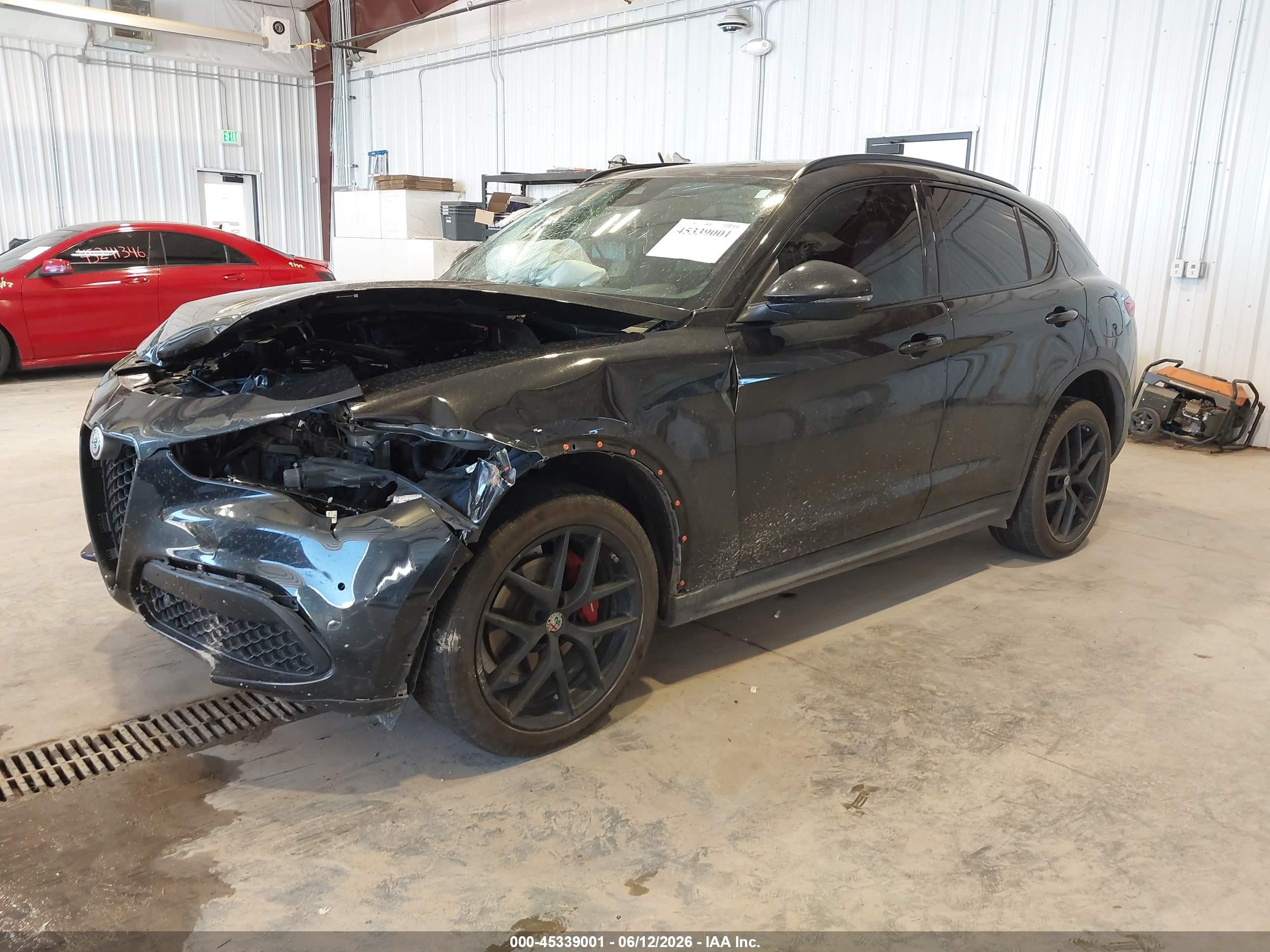 2018 Alfa romeo Stelvio VIN ZASFAKNN5J7B98677 IAAI salvage auction — Unknown, Salvage (Utah), sold $350 on 2026-09-08 (photo 2)
