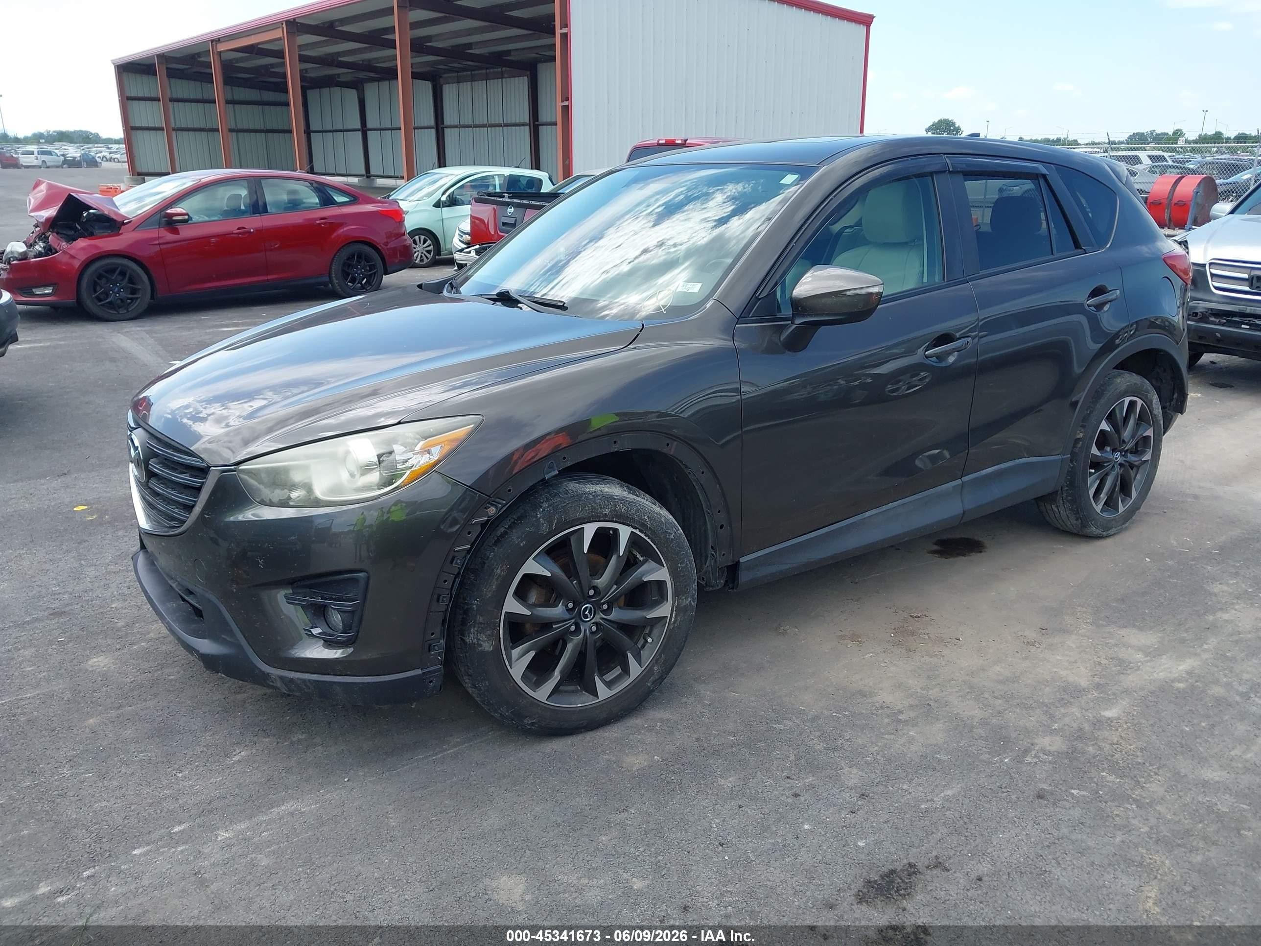 2016 Mazda Cx-5 VIN JM3KE4DY2G0686643 IAAI salvage auction — Unknown, Salvage (Illinois), sold $2,500 on 2026-09-08 (photo 2)