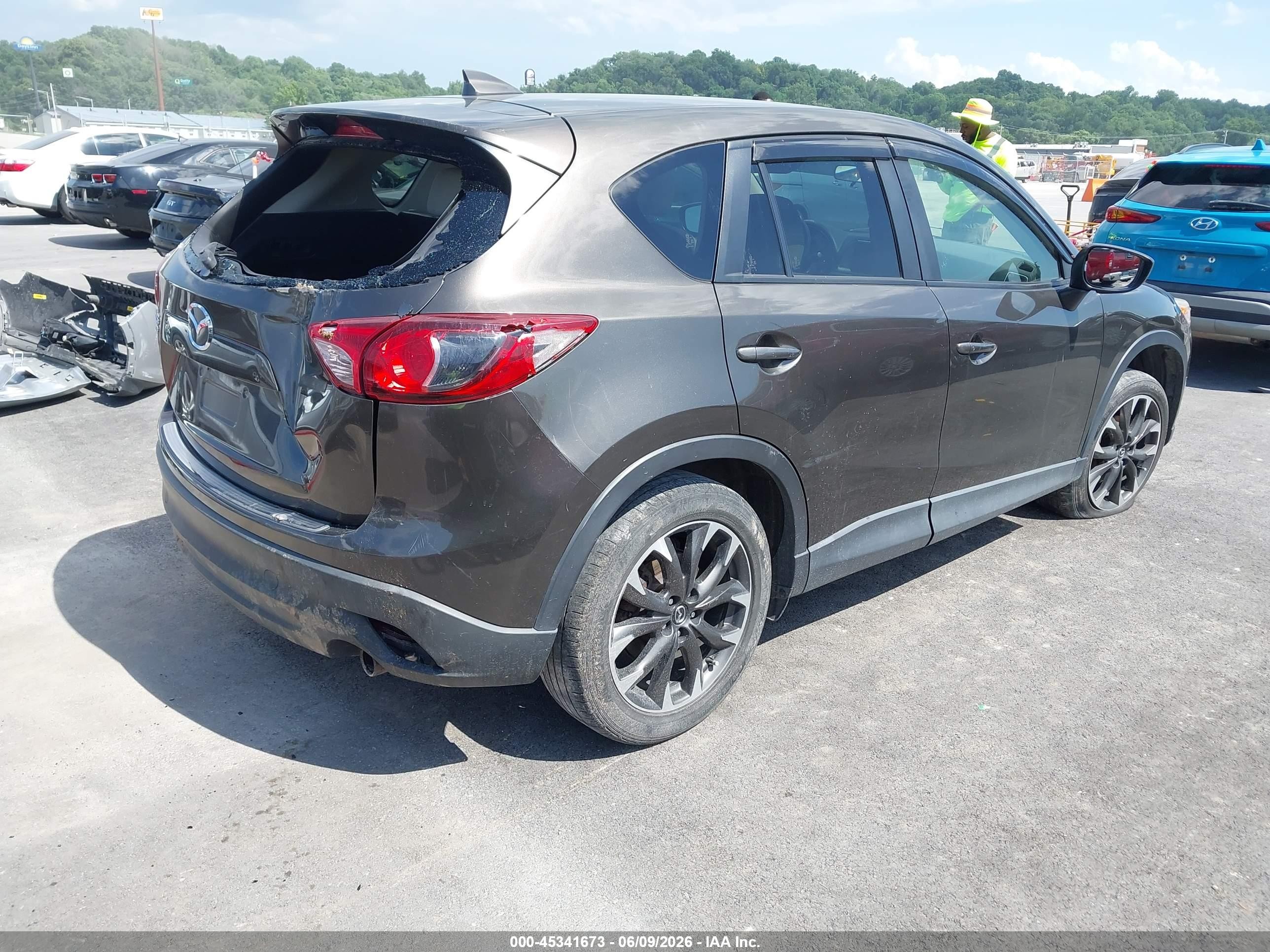 2016 Mazda Cx-5 VIN JM3KE4DY2G0686643 IAAI salvage auction — Unknown, Salvage (Illinois), sold $2,500 on 2026-09-08 (photo 4)