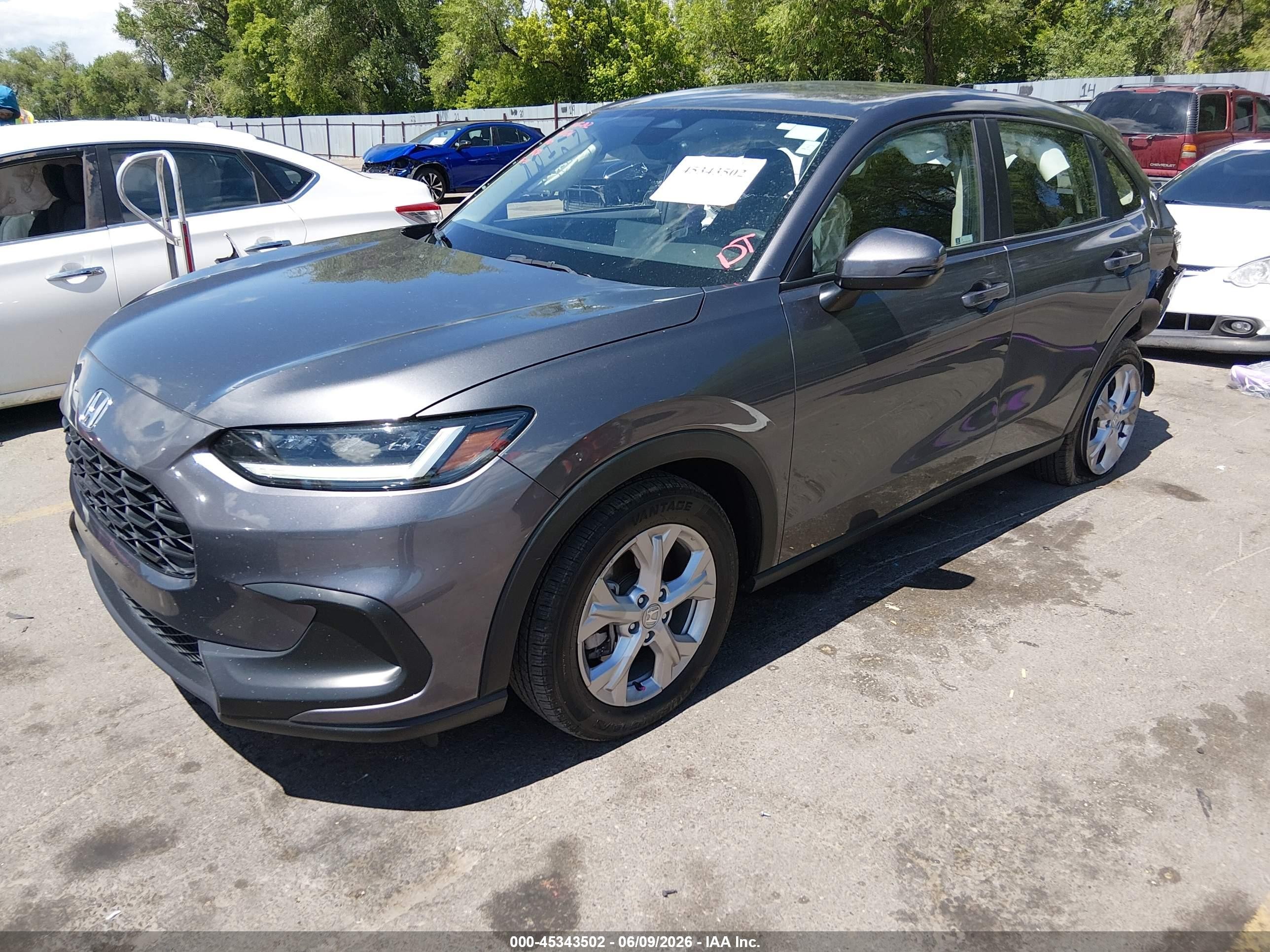 2023 Honda HR-V VIN 3CZRZ2H33PM743891 IAAI salvage auction — Side, Salvage (Utah), sold $3,475 on 2026-07-09 (photo 2)