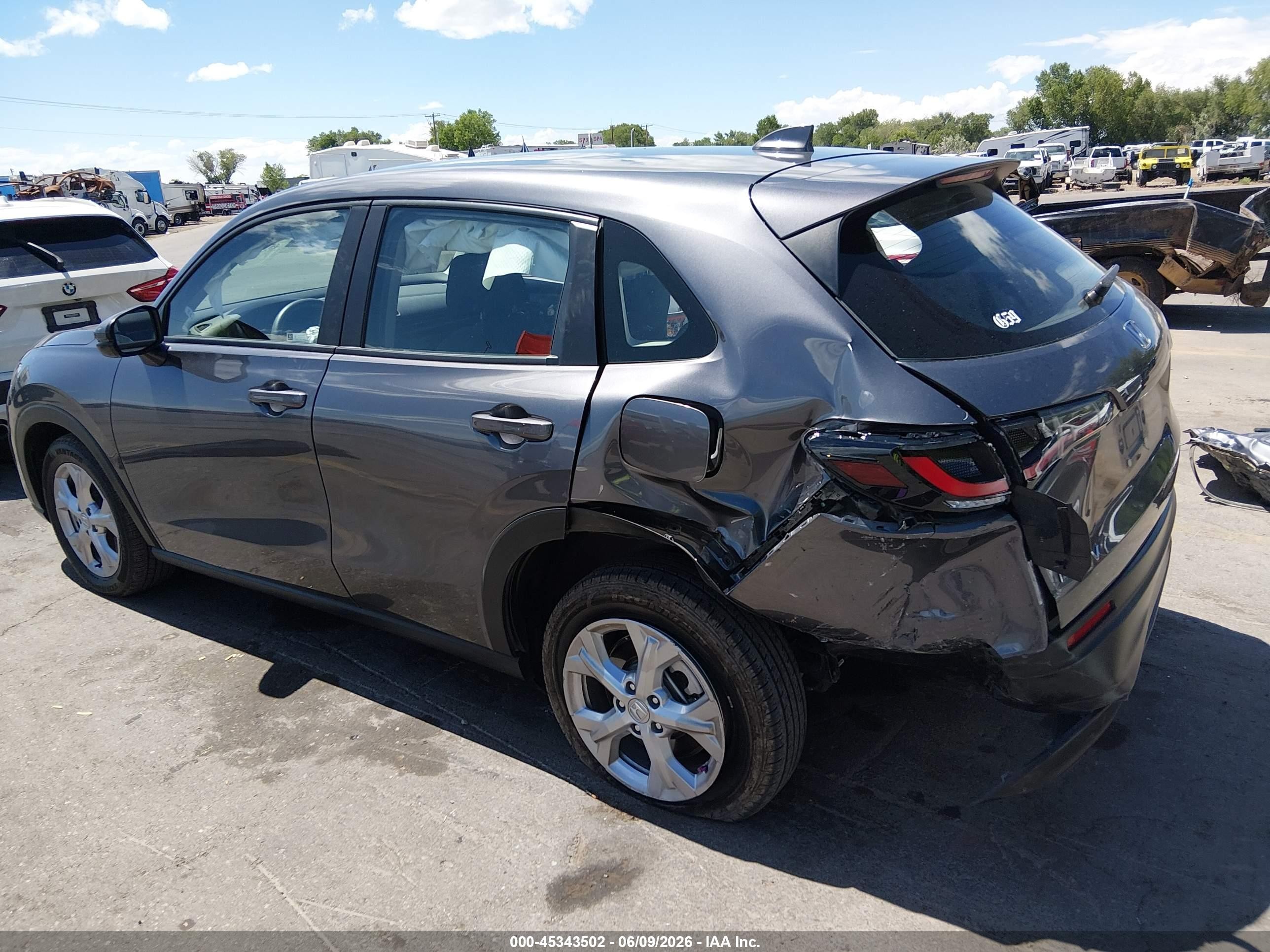 2023 Honda HR-V VIN 3CZRZ2H33PM743891 IAAI salvage auction — Side, Salvage (Utah), sold $3,475 on 2026-07-09 (photo 3)