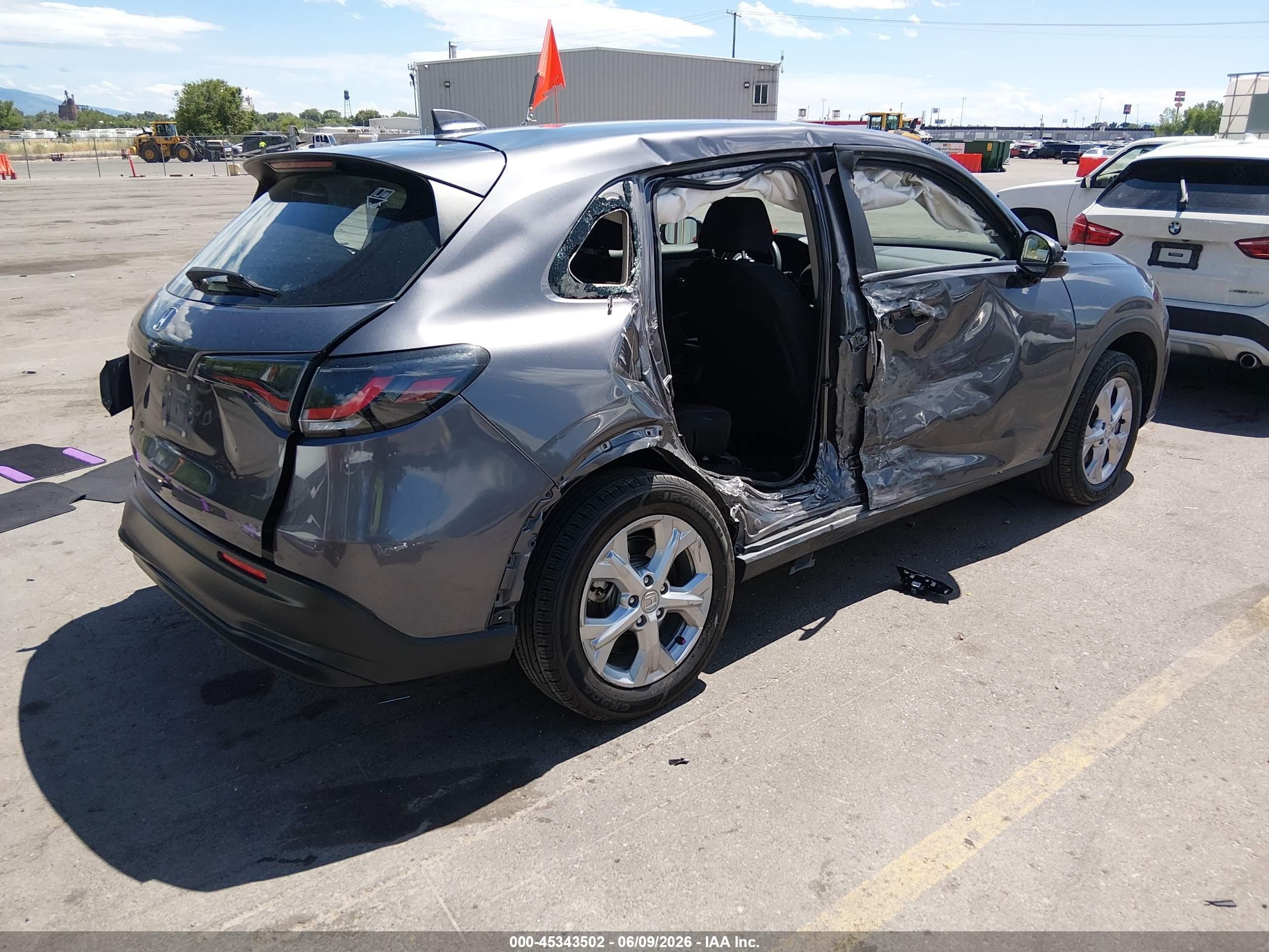 2023 Honda HR-V VIN 3CZRZ2H33PM743891 IAAI salvage auction — Side, Salvage (Utah), sold $3,475 on 2026-07-09 (photo 4)