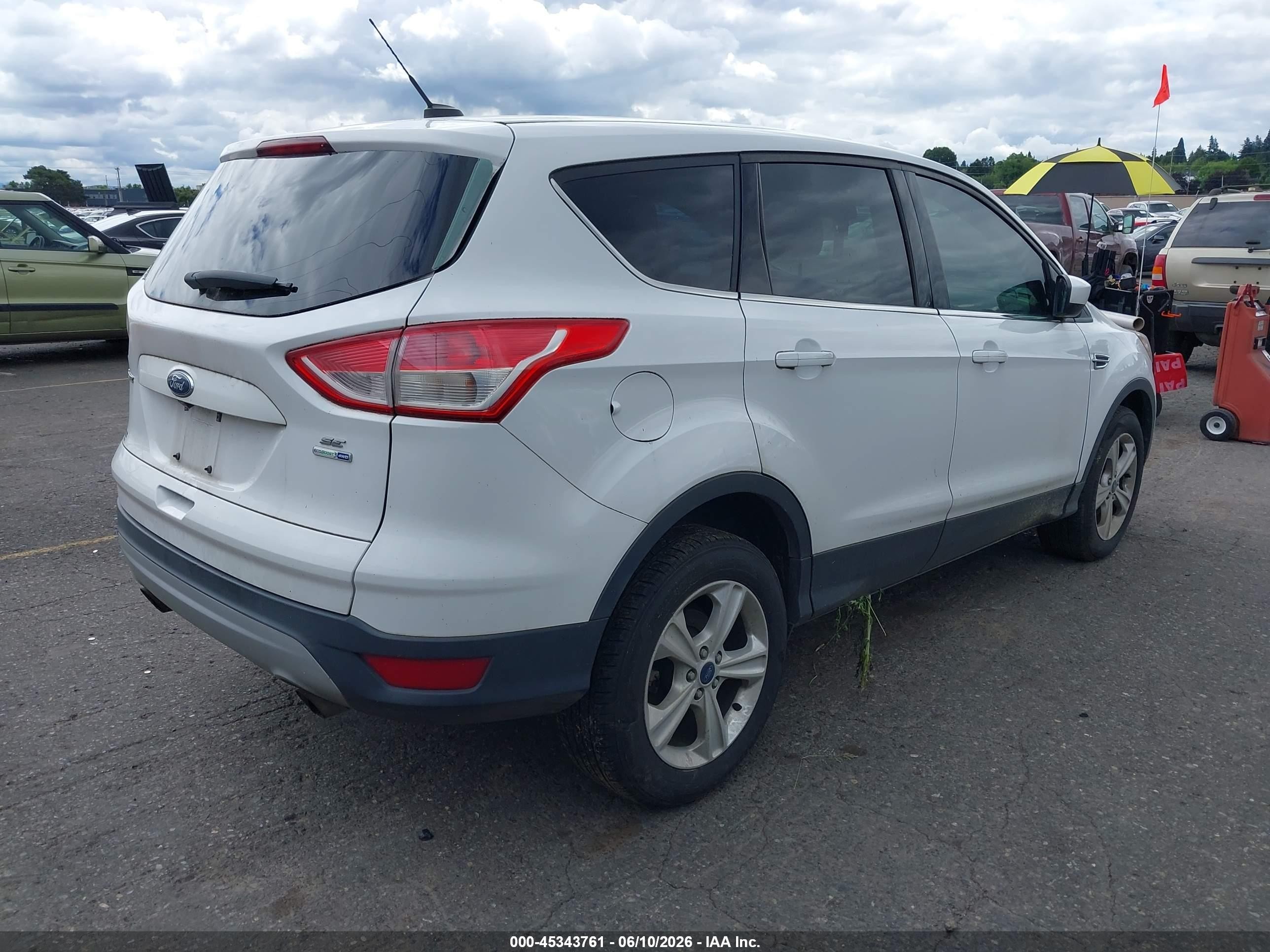 2016 Ford Escape VIN 1FMCU9GX5GUC81798 IAAI salvage auction — Normal Wear, Clear-Dealer Only (Oregon), sold $1,250 on 2026-07-06 (photo 4)