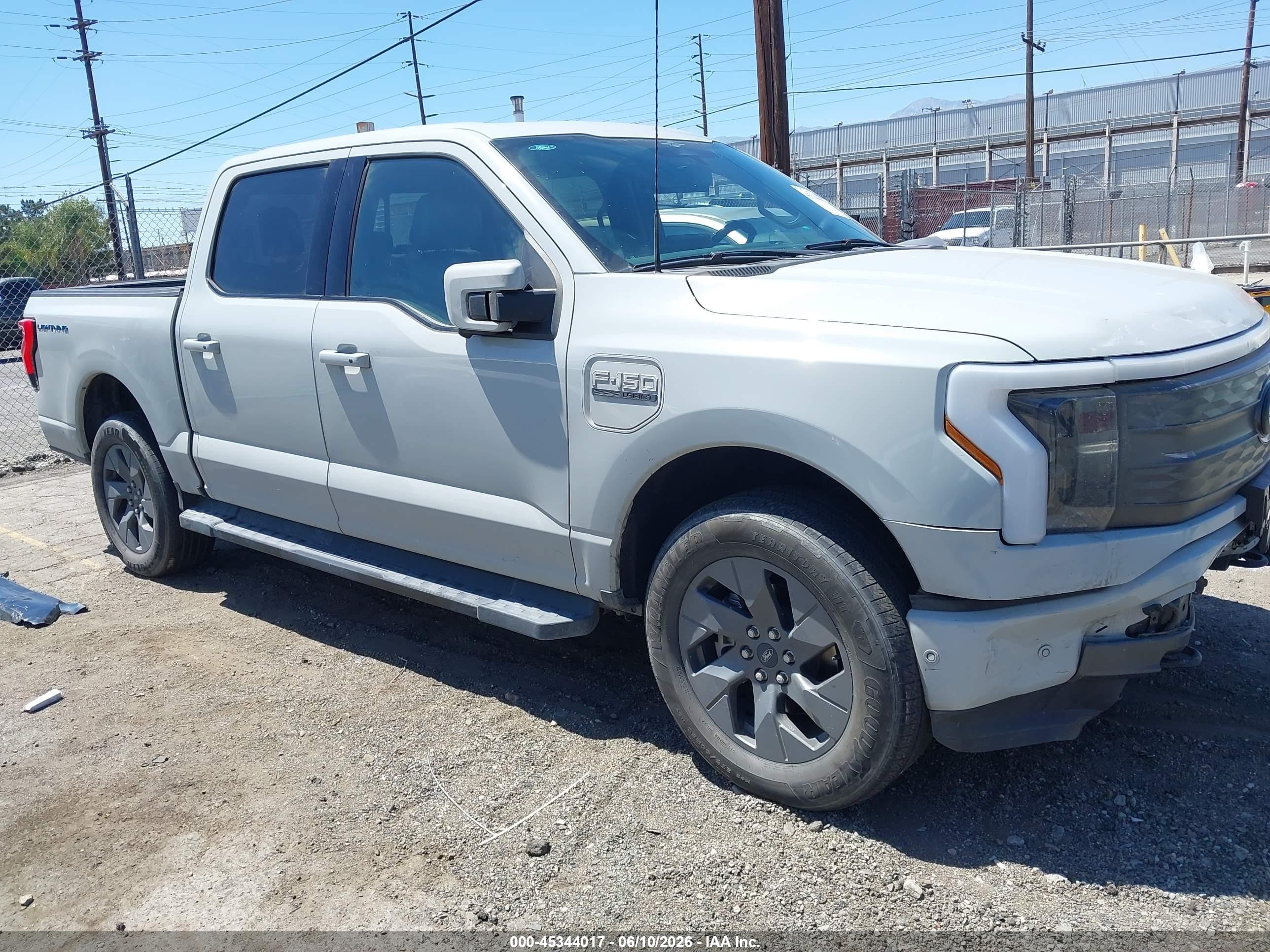 2023 Ford F-150 Lightning VIN 1FT6W1EV2PWG56579 — IAAI salvage auction photo