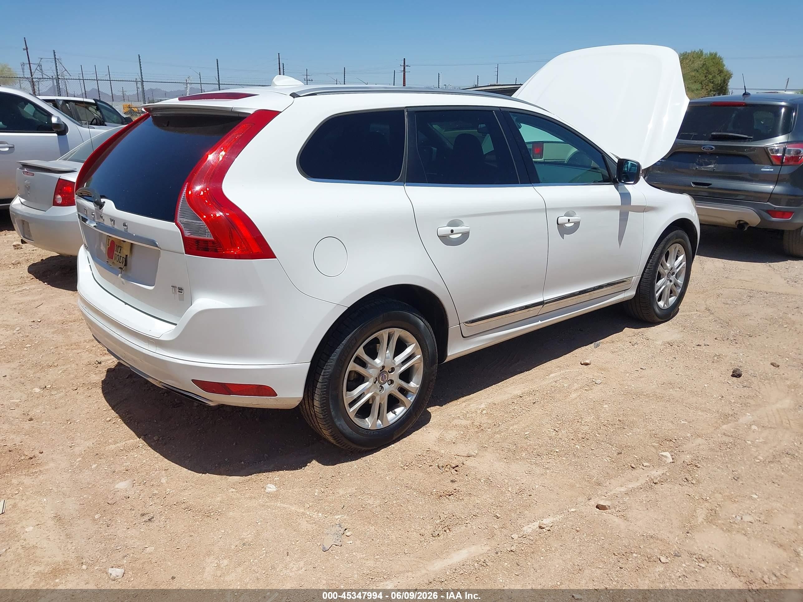 2015 Volvo XC60 VIN YV426MDB3F2588450 IAAI salvage auction — Normal Wear, Clear-Dealer Only (Arizona), sold $725 on 2026-07-02 (photo 4)