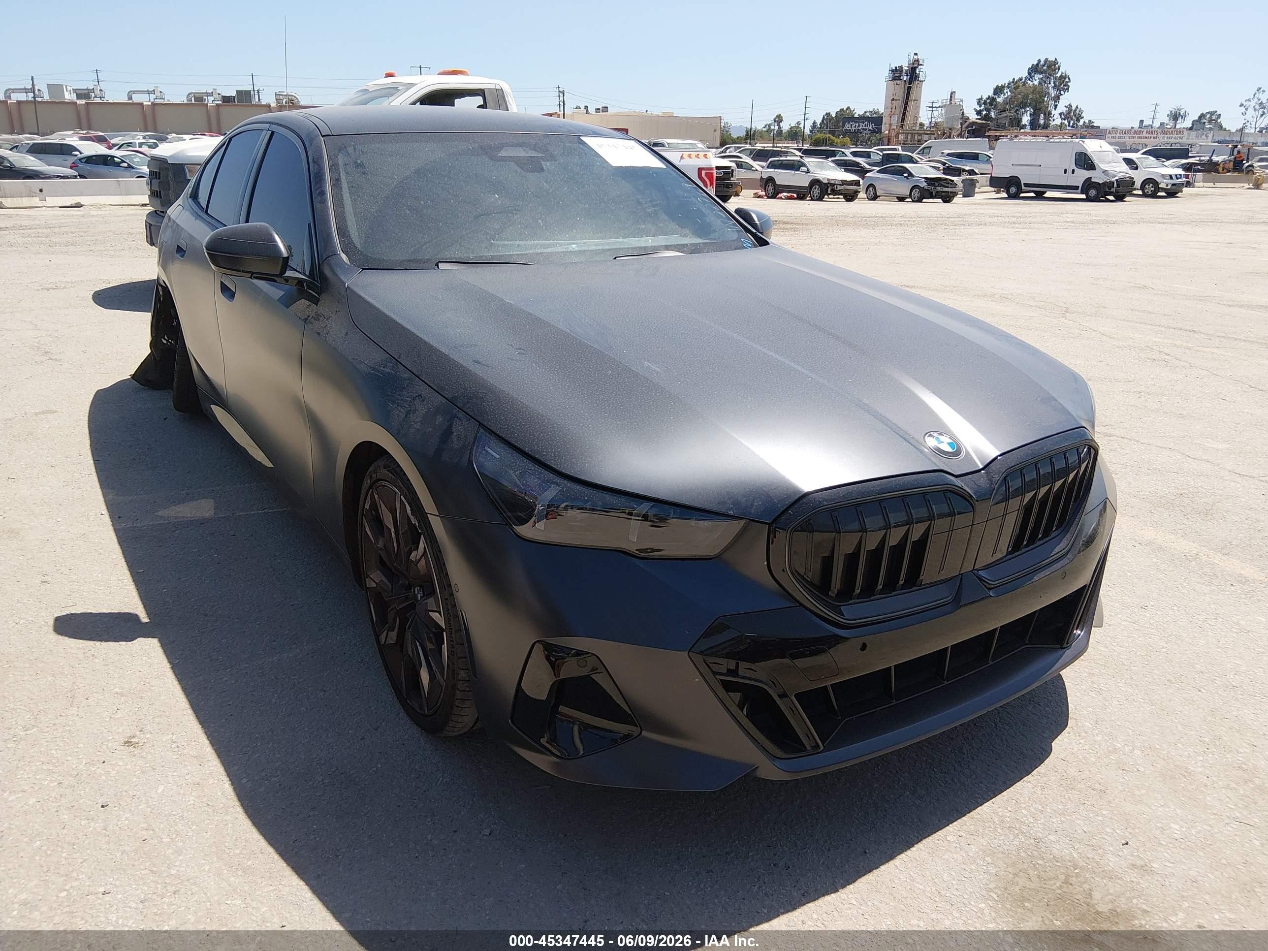 2026 BMW 5 Series VIN WBA43FJ01TCW22729 — IAAI salvage auction photo