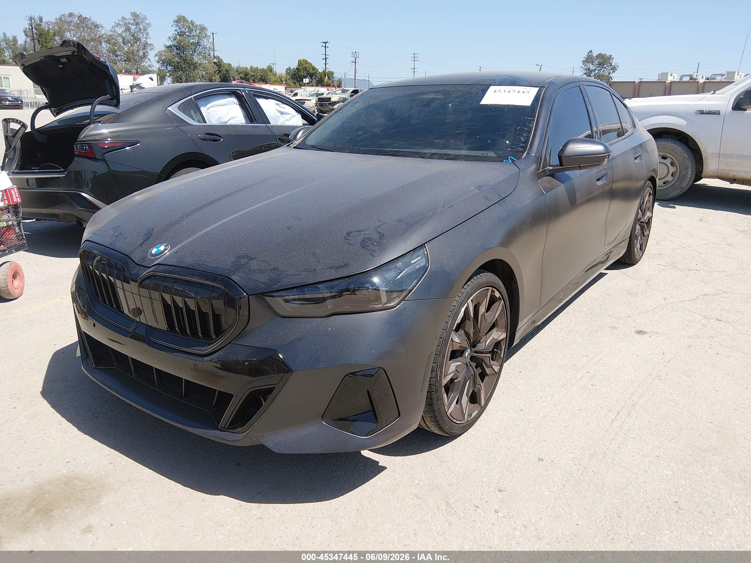2026 BMW 5 Series VIN WBA43FJ01TCW22729 IAAI salvage auction — Rear End, Salvage (California), sold $33,000 on 2026-08-20 (photo 2)