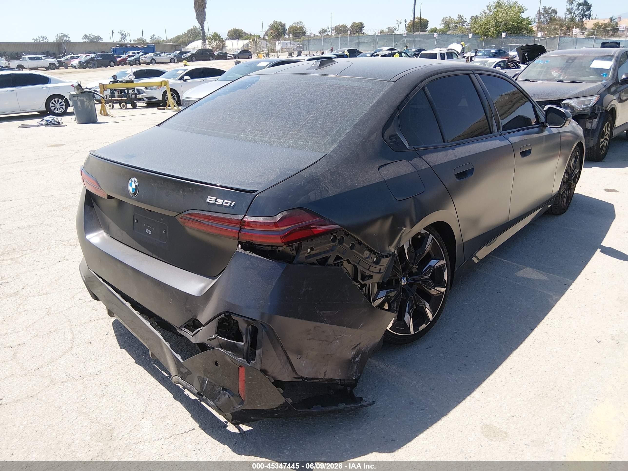 2026 BMW 5 Series VIN WBA43FJ01TCW22729 IAAI salvage auction — Rear End, Salvage (California), sold $33,000 on 2026-08-20 (photo 4)