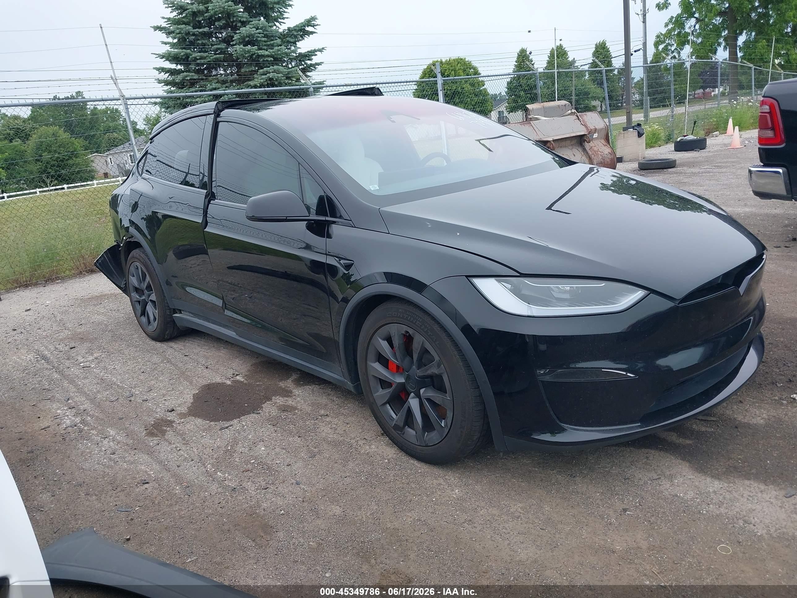 2024 Tesla Model X VIN 7SAXCBE62RF437093 — IAAI salvage auction photo