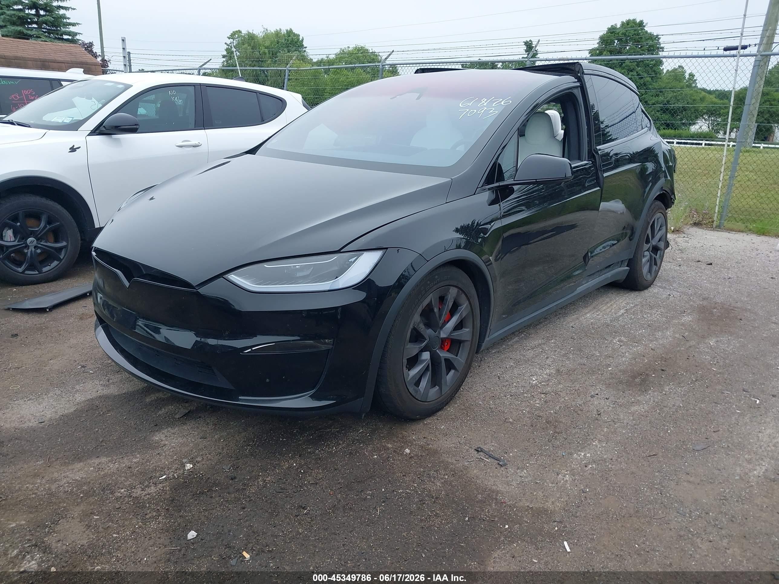 2024 Tesla Model X VIN 7SAXCBE62RF437093 IAAI salvage auction — Rear End, Clear (Michigan), sold $23,100 on 2026-08-20 (photo 2)