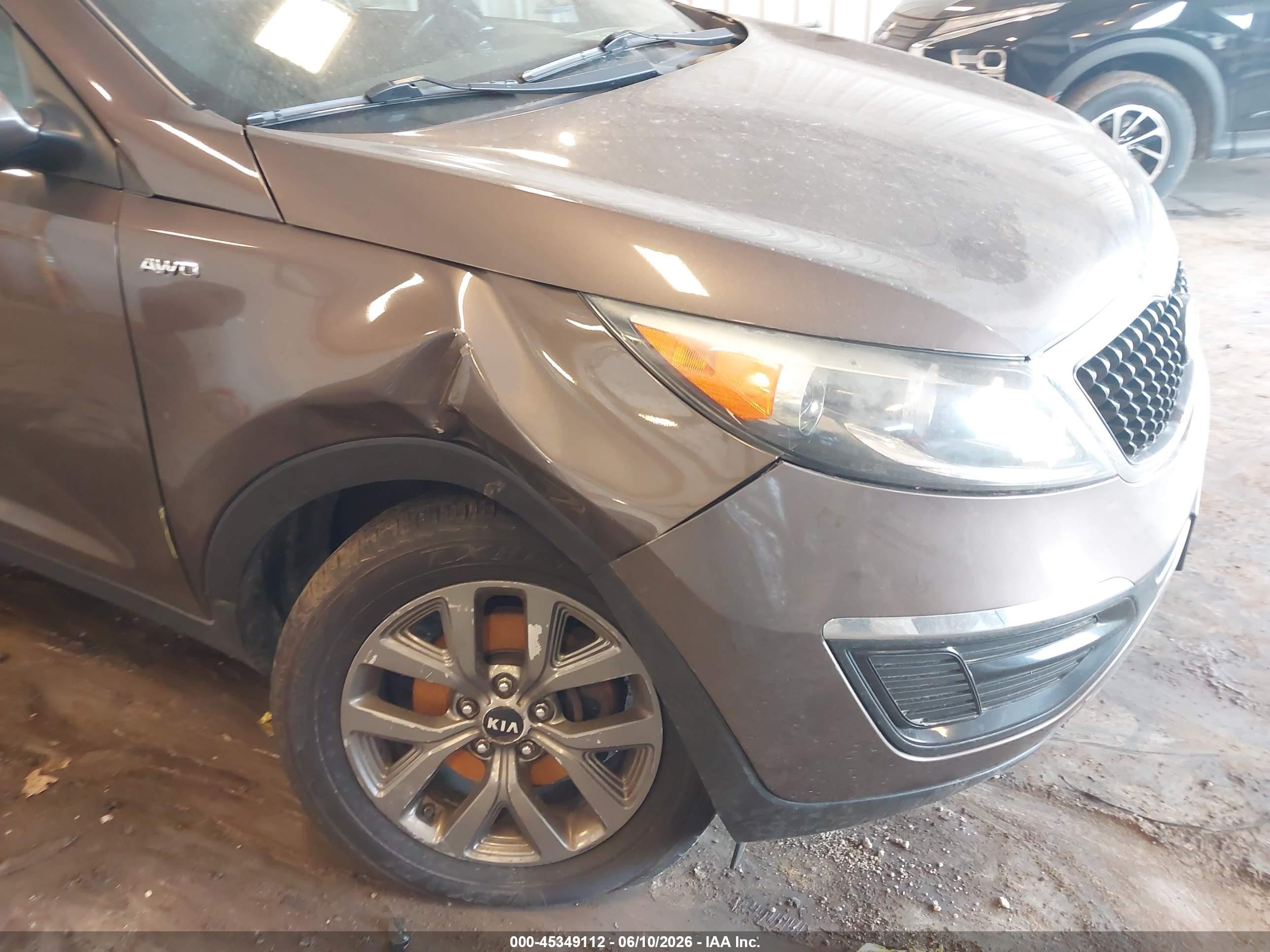 2015 Kia Sportage VIN KNDPBCACXF7705780 IAAI salvage auction — Unknown, Clear (Michigan), sold $775 on 2026-09-08 (photo 6)