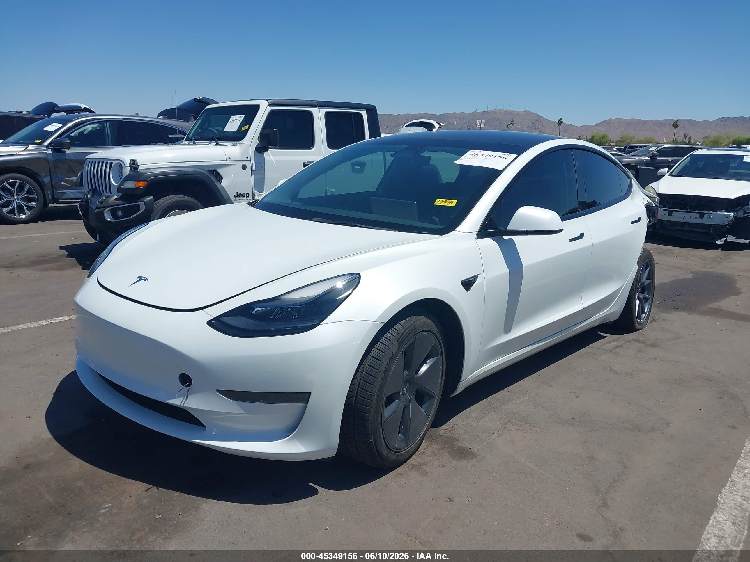 2023 Tesla Model 3 VIN 5YJ3E1EA5PF409788 IAAI salvage auction — Rear End, Salvage (Arizona), sold $7,150 on 2026-06-30 (photo 2)