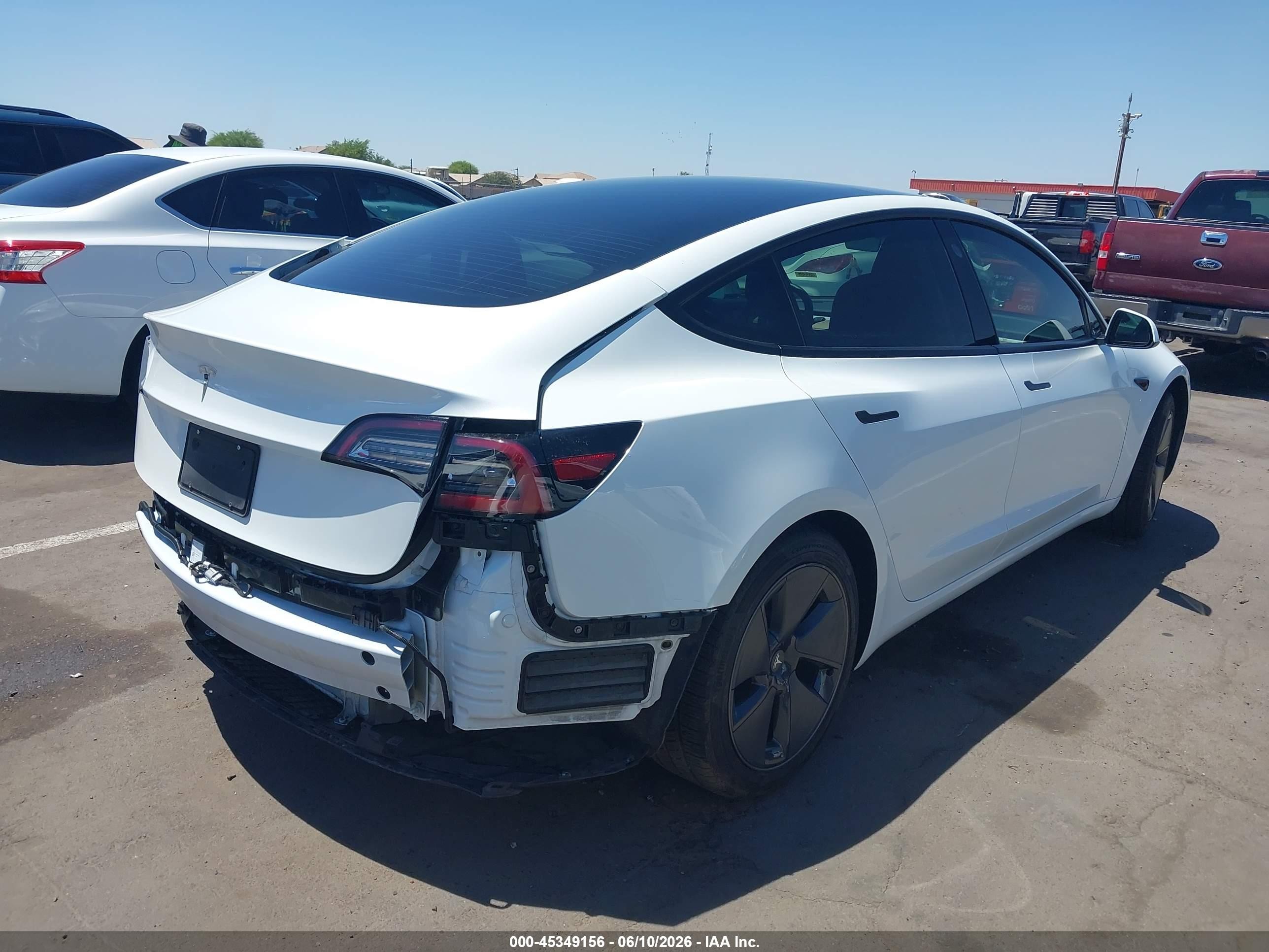 2023 Tesla Model 3 VIN 5YJ3E1EA5PF409788 IAAI salvage auction — Rear End, Salvage (Arizona), sold $7,150 on 2026-06-30 (photo 4)