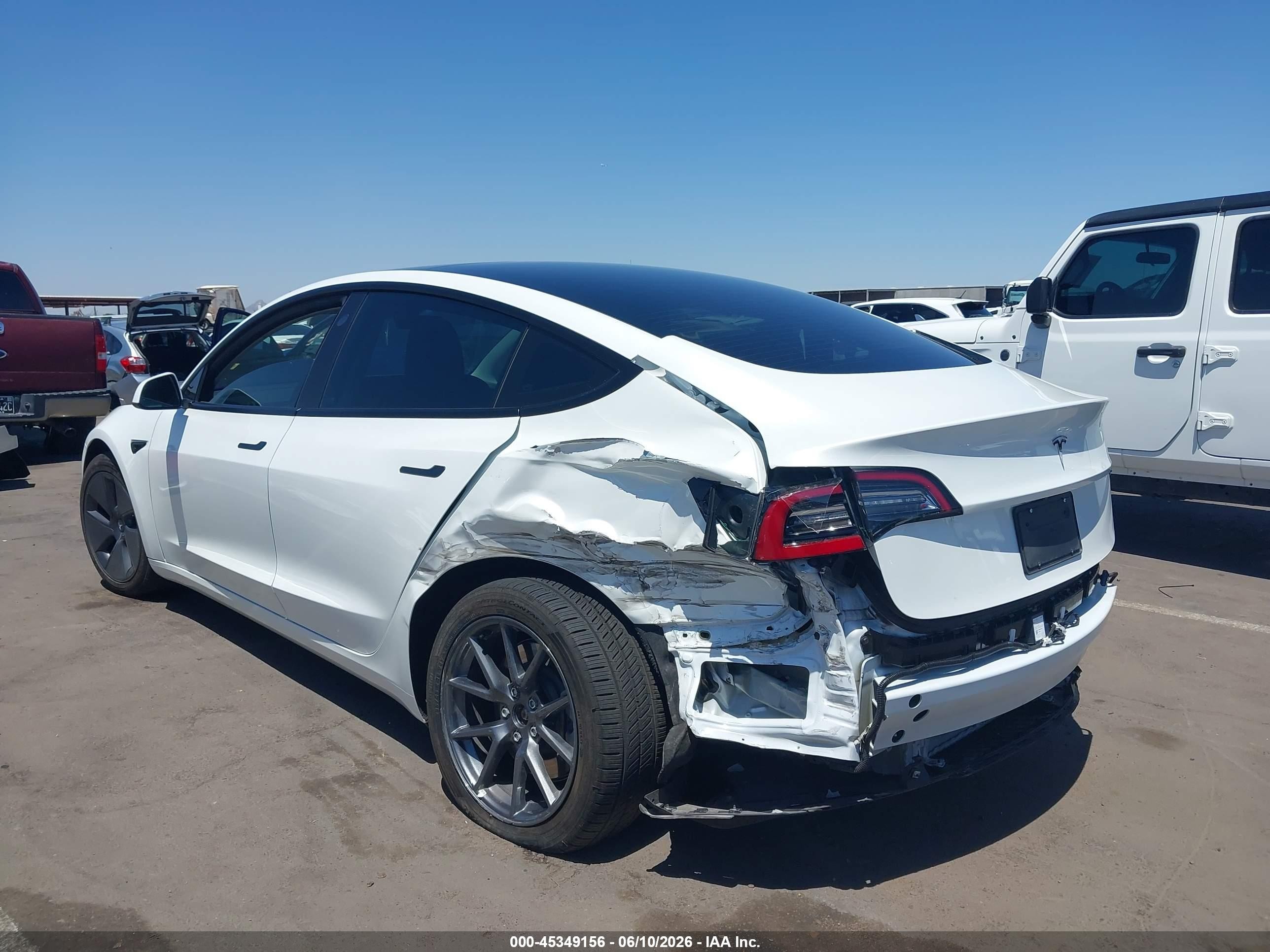2023 Tesla Model 3 VIN 5YJ3E1EA5PF409788 IAAI salvage auction — Rear End, Salvage (Arizona), sold $7,150 on 2026-06-30 (photo 6)