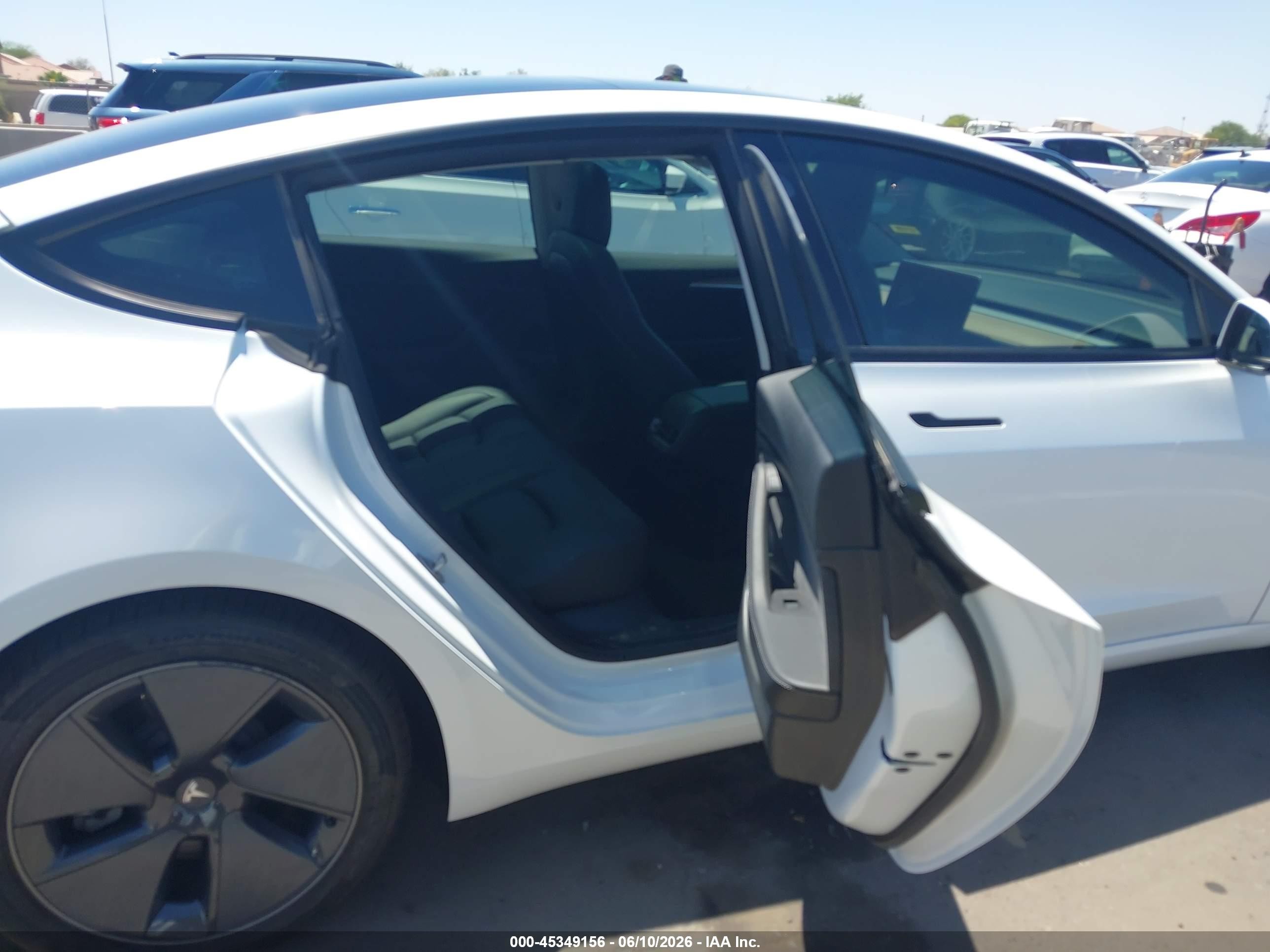 2023 Tesla Model 3 VIN 5YJ3E1EA5PF409788 IAAI salvage auction — Rear End, Salvage (Arizona), sold $7,150 on 2026-06-30 (photo 8)