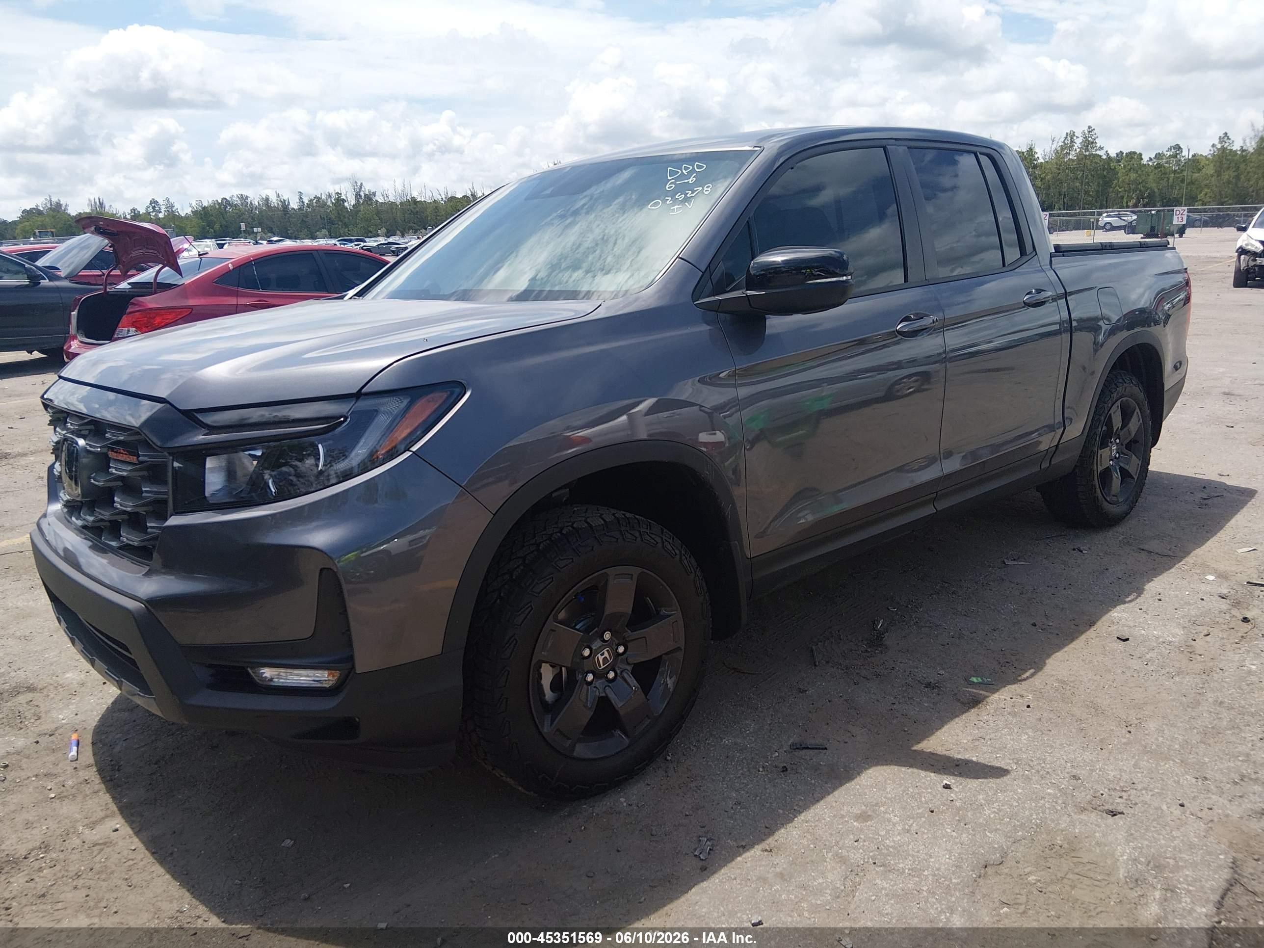 2026 Honda Ridgeline VIN 5FPYK3F64TB025278 IAAI salvage auction — Side, Rebuildable (Florida), sold $14,500 on 2026-06-29 (photo 2)