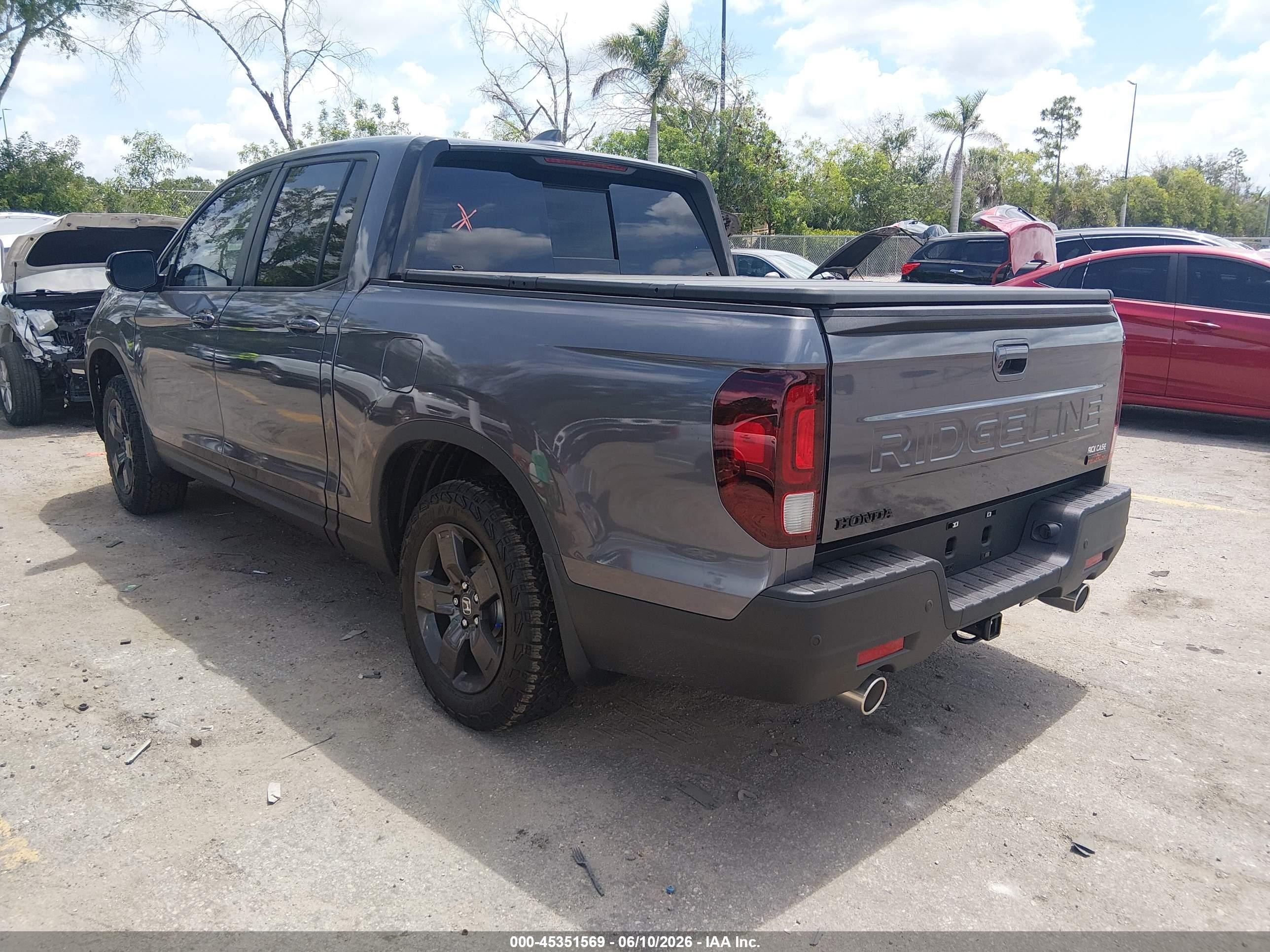 2026 Honda Ridgeline VIN 5FPYK3F64TB025278 IAAI salvage auction — Side, Rebuildable (Florida), sold $14,500 on 2026-06-29 (photo 3)