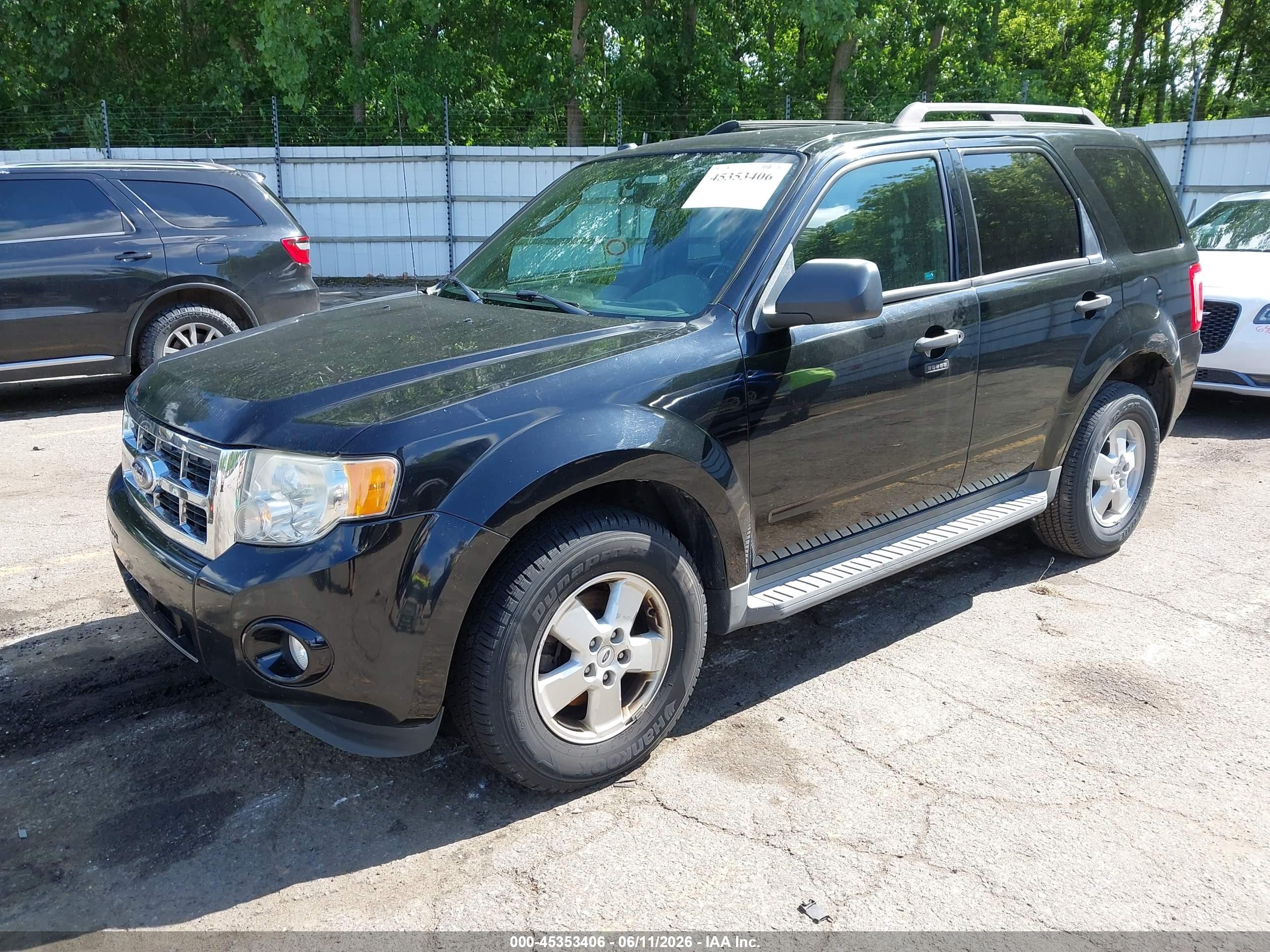 2010 Ford Escape VIN 1FMCU0DG7AKA87048 IAAI salvage auction — Normal Wear, Clear (Michigan), sold $400 on 2026-07-12 (photo 2)