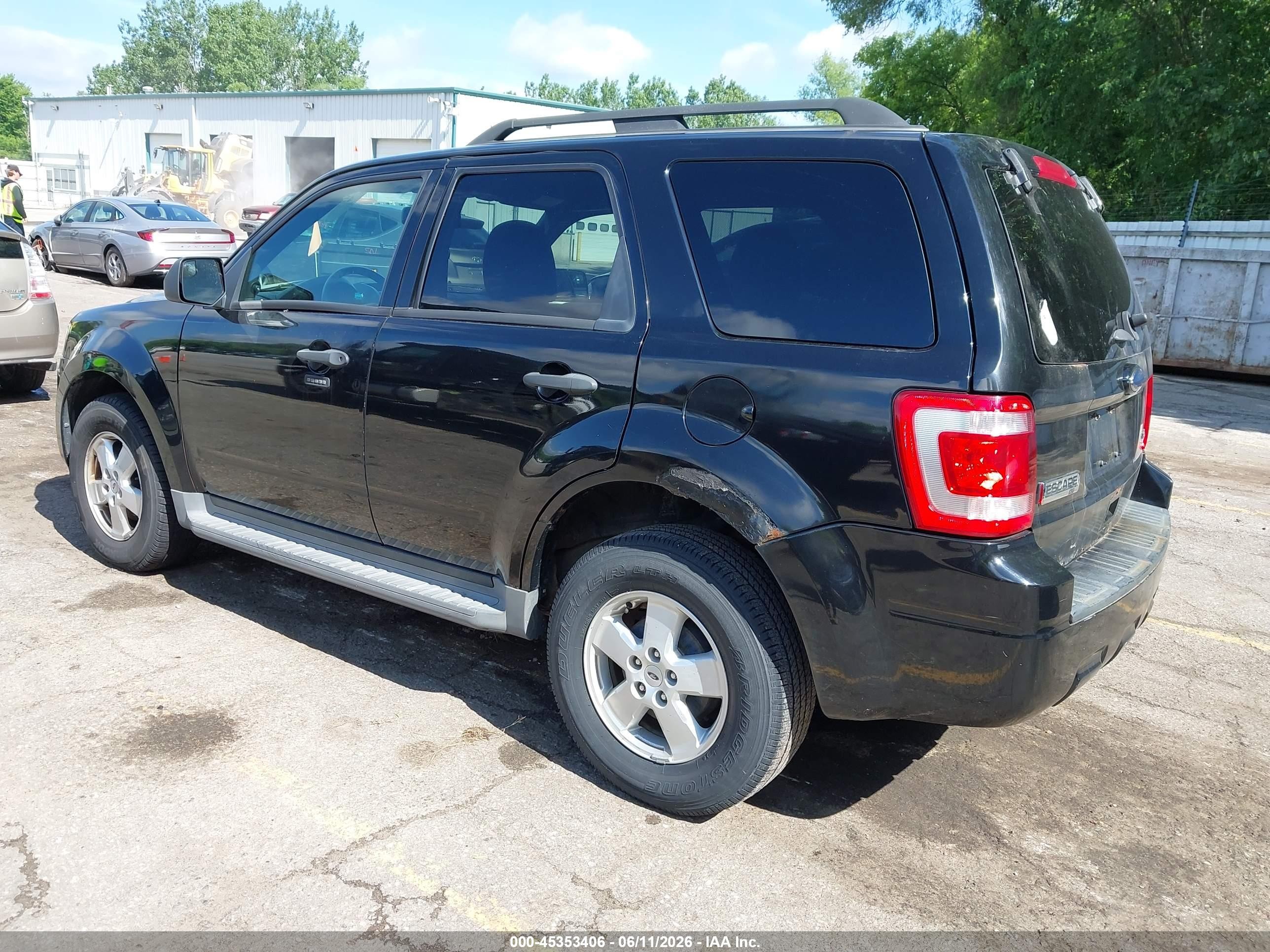 2010 Ford Escape VIN 1FMCU0DG7AKA87048 IAAI salvage auction — Normal Wear, Clear (Michigan), sold $400 on 2026-07-12 (photo 3)