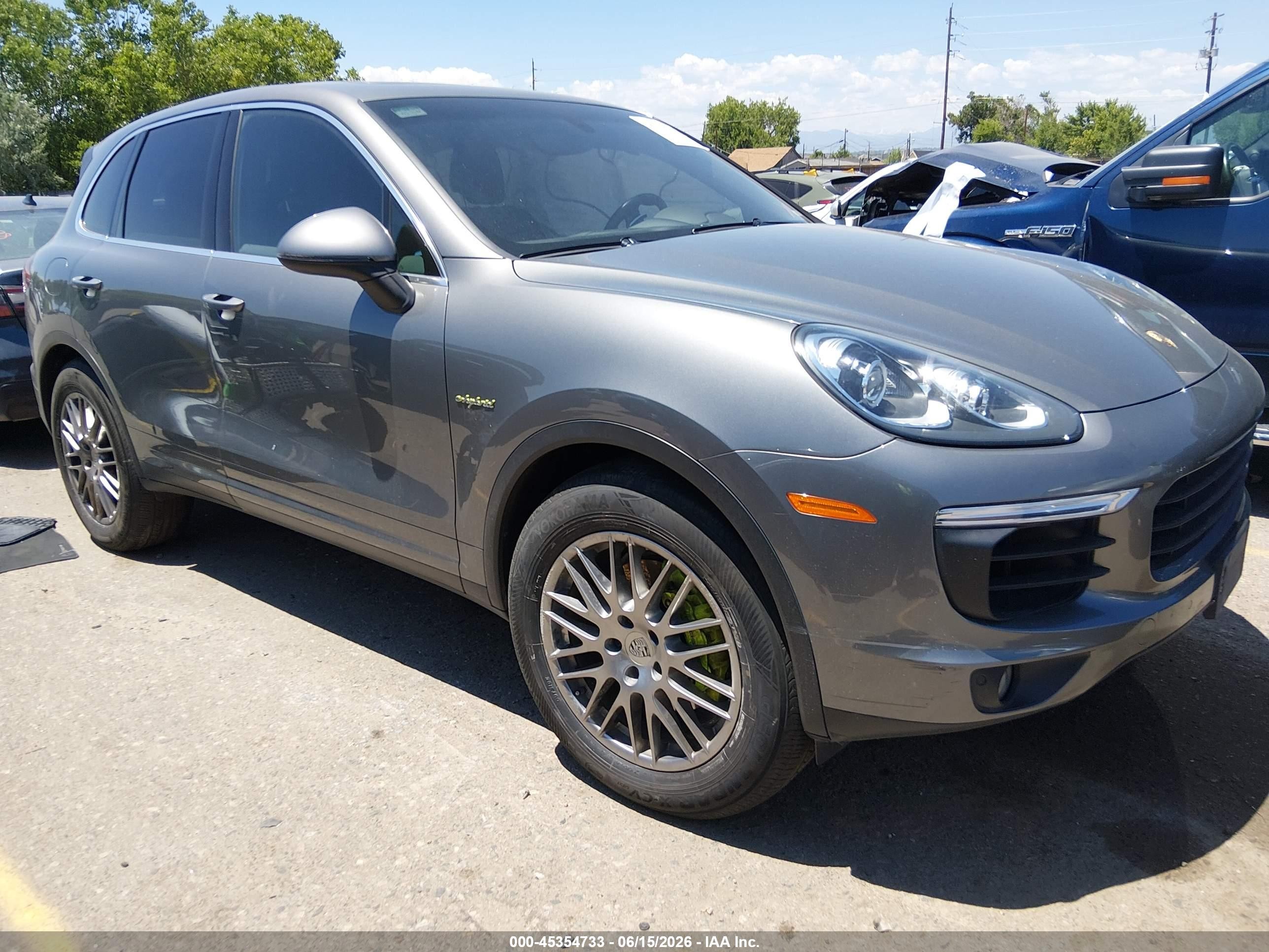 2015 Porsche Cayenne VIN WP1AE2A29FLA52010 IAAI salvage auction — Side, Salvage (Colorado), sold $3,950 on 2026-07-29 (photo 1)