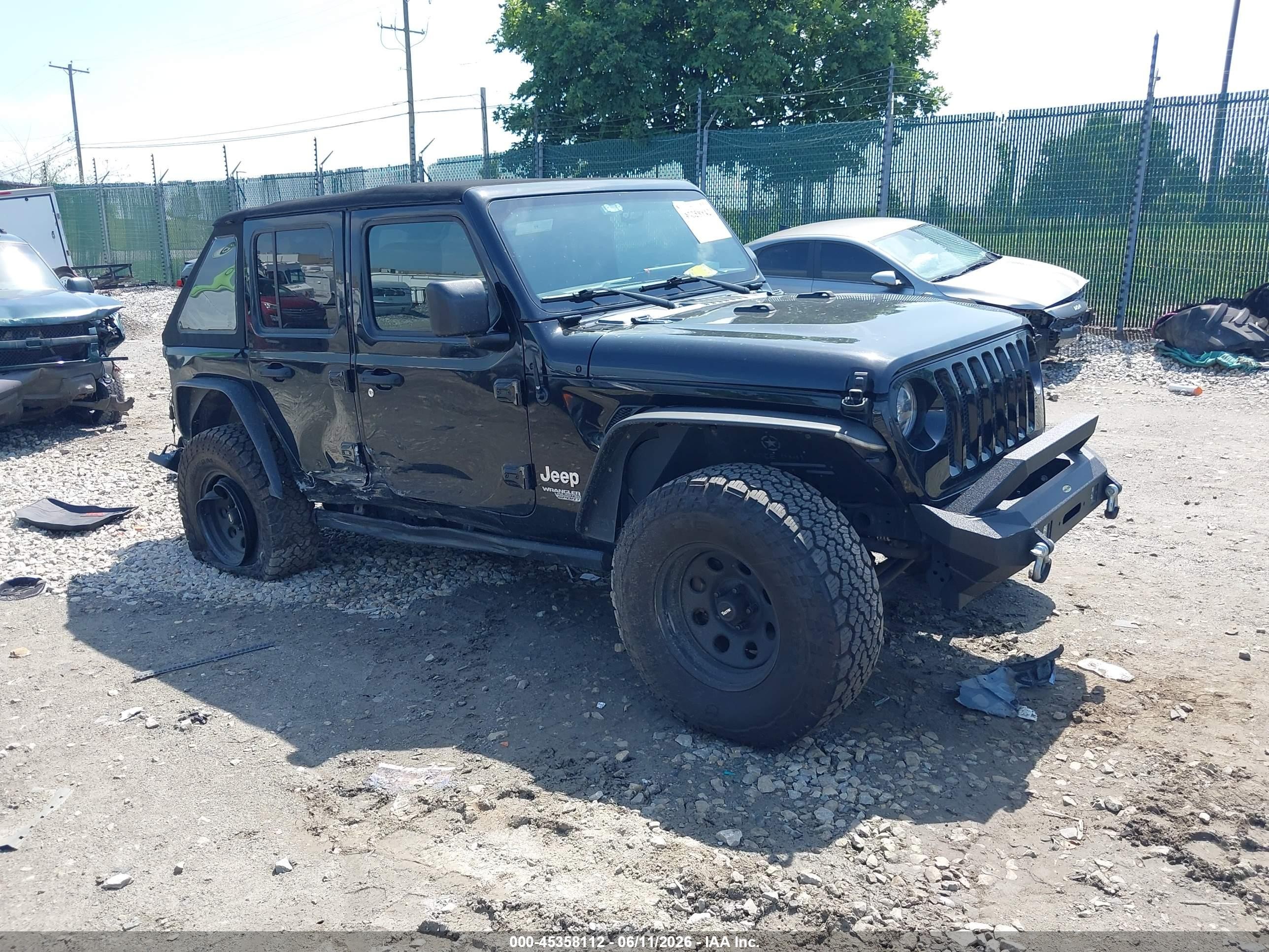 2019 Jeep Wrangler Unlimited VIN 1C4HJXDG5KW648451 IAAI salvage auction — Side, Salvage (Pennsylvania), sold $6,600 on 2026-07-12 (photo 1)