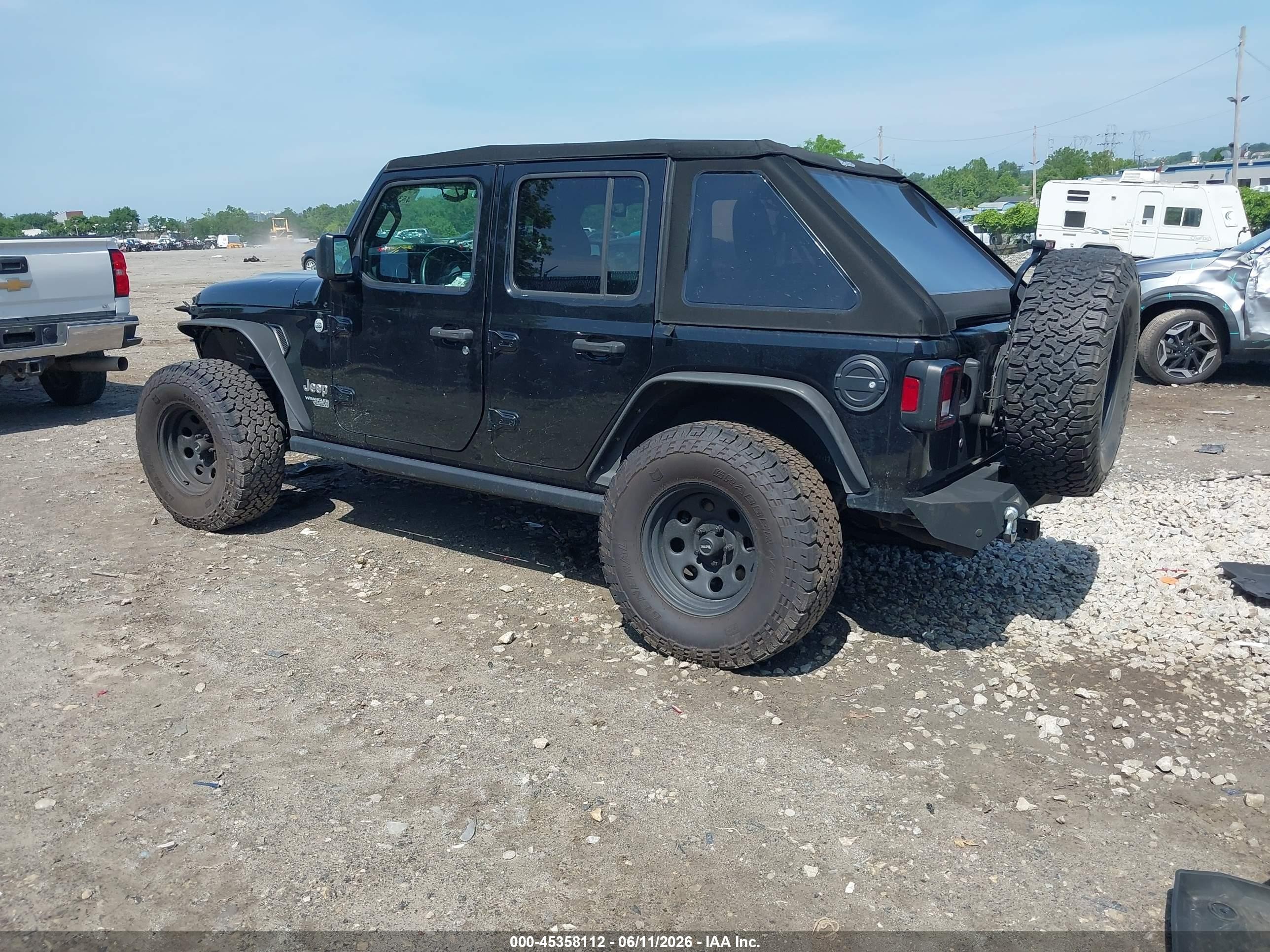 2019 Jeep Wrangler Unlimited VIN 1C4HJXDG5KW648451 IAAI salvage auction — Side, Salvage (Pennsylvania), sold $6,600 on 2026-07-12 (photo 3)