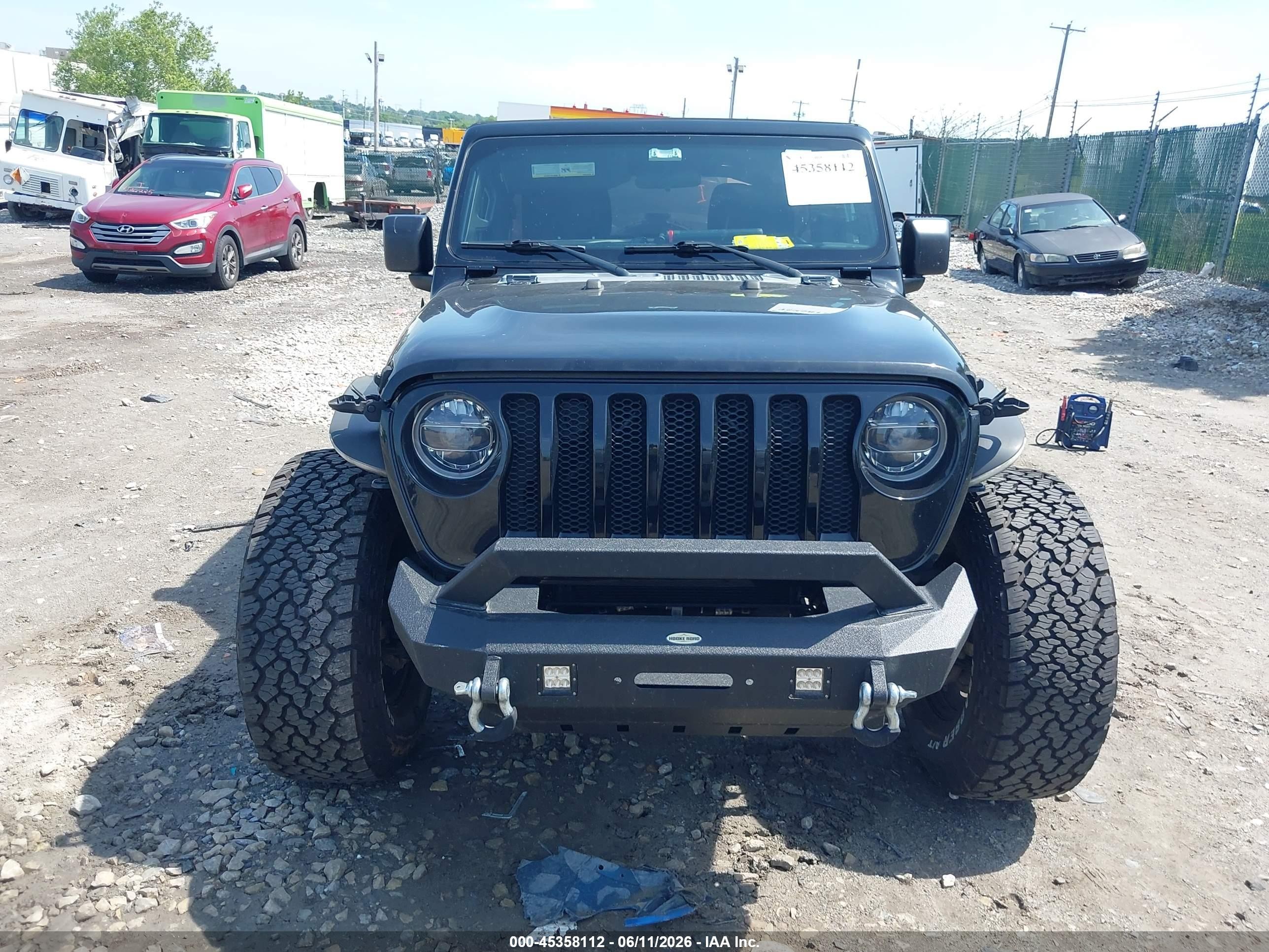 2019 Jeep Wrangler Unlimited VIN 1C4HJXDG5KW648451 IAAI salvage auction — Side, Salvage (Pennsylvania), sold $6,600 on 2026-07-12 (photo 6)