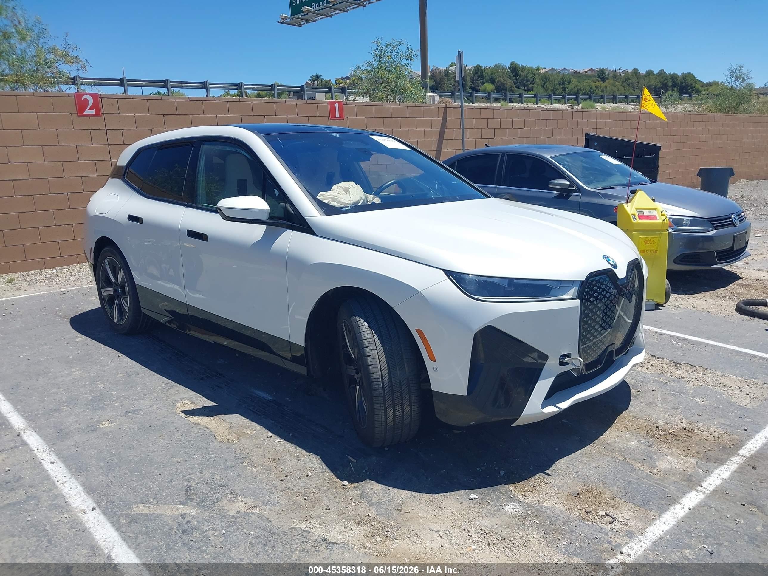 2024 BMW iX VIN WB523CF07RCN33169 — IAAI salvage auction photo