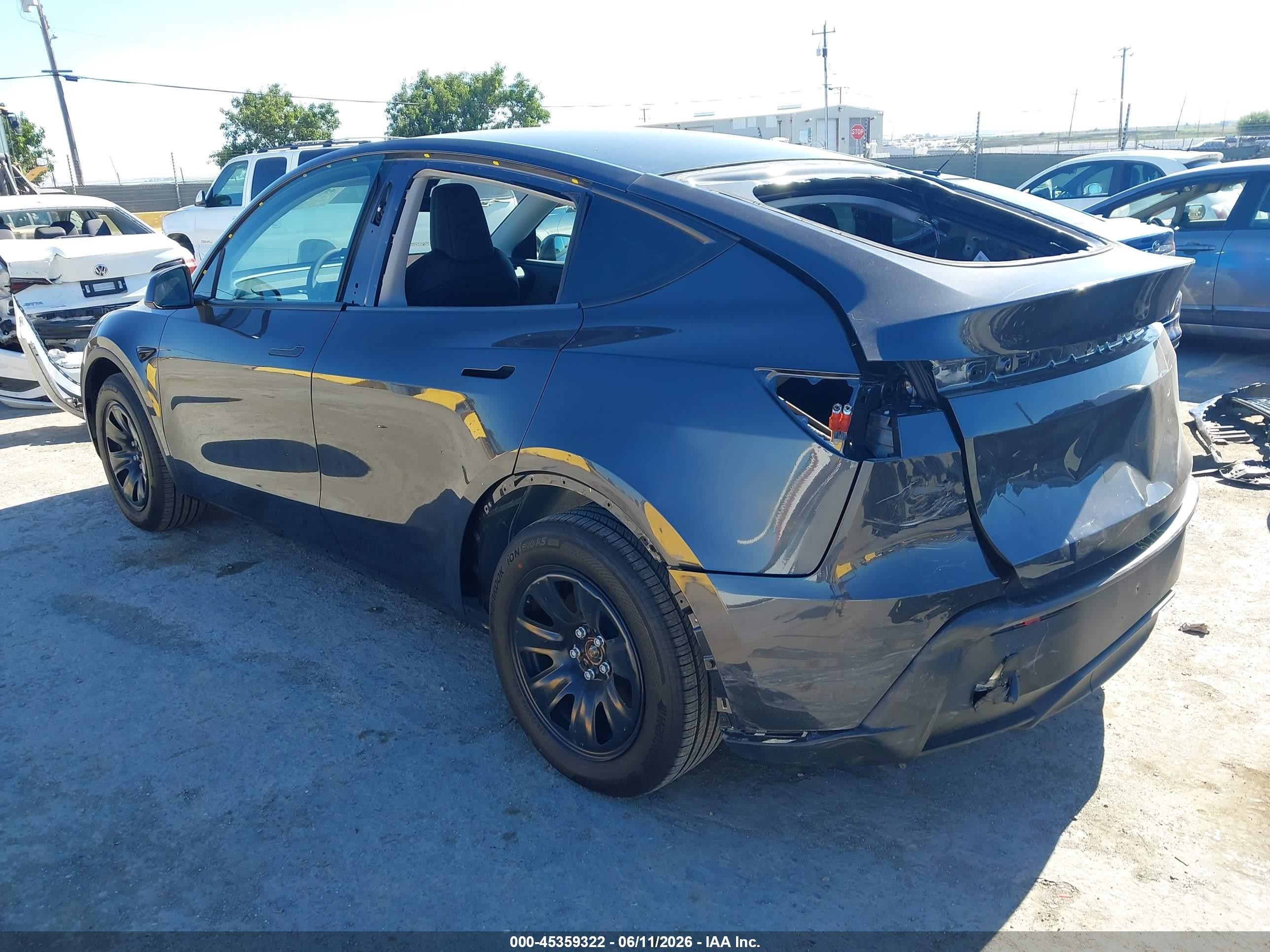 2026 Tesla Model Y VIN 7SAYGDED5TA607440 IAAI salvage auction — Rear End, Salvage (California), sold $17,550 on 2026-07-09 (photo 3)