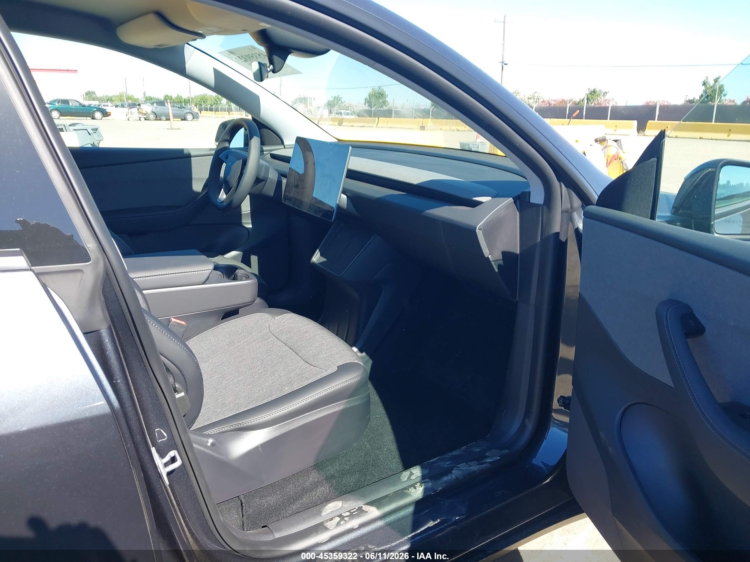 2026 Tesla Model Y VIN 7SAYGDED5TA607440 IAAI salvage auction — Rear End, Salvage (California), sold $17,550 on 2026-07-09 (photo 5)