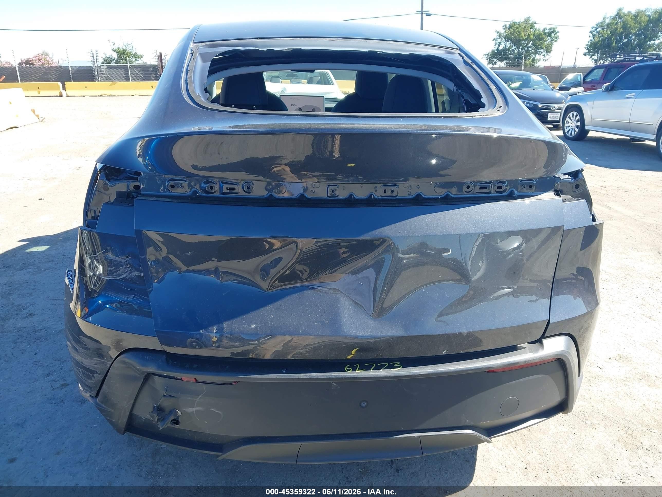 2026 Tesla Model Y VIN 7SAYGDED5TA607440 IAAI salvage auction — Rear End, Salvage (California), sold $17,550 on 2026-07-09 (photo 6)