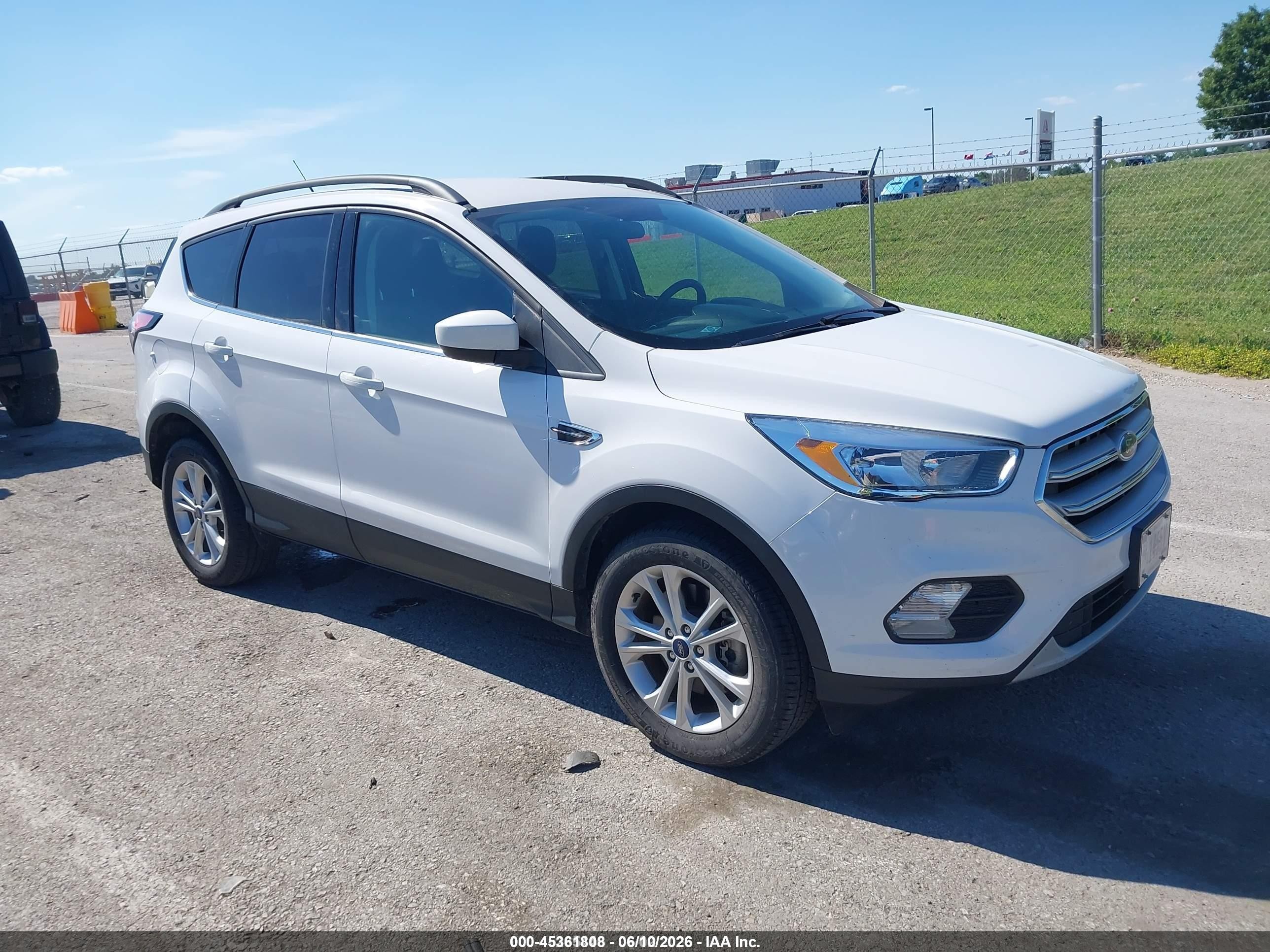 2018 Ford Escape VIN 1FMCU9GD7JUD08450 IAAI salvage auction — Normal Wear, SF97 (Illinois), sold $4,750 on 2026-07-09 (photo 1)